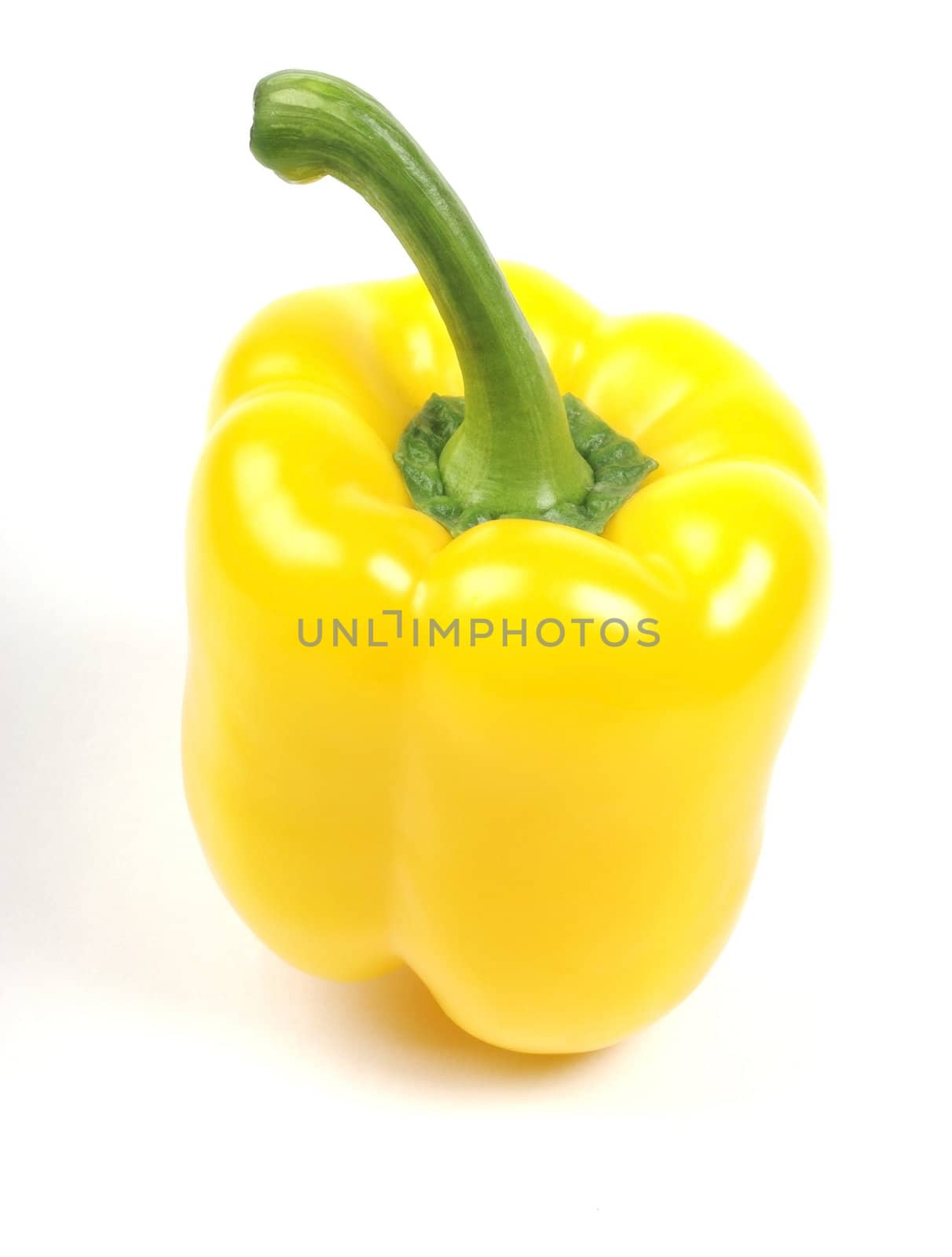 Yellow pepper macro isolated on white background. by borodaev