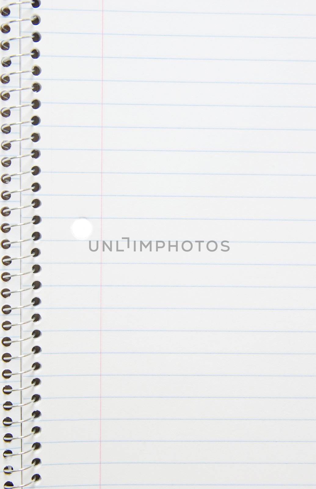 open spiral note book with lines