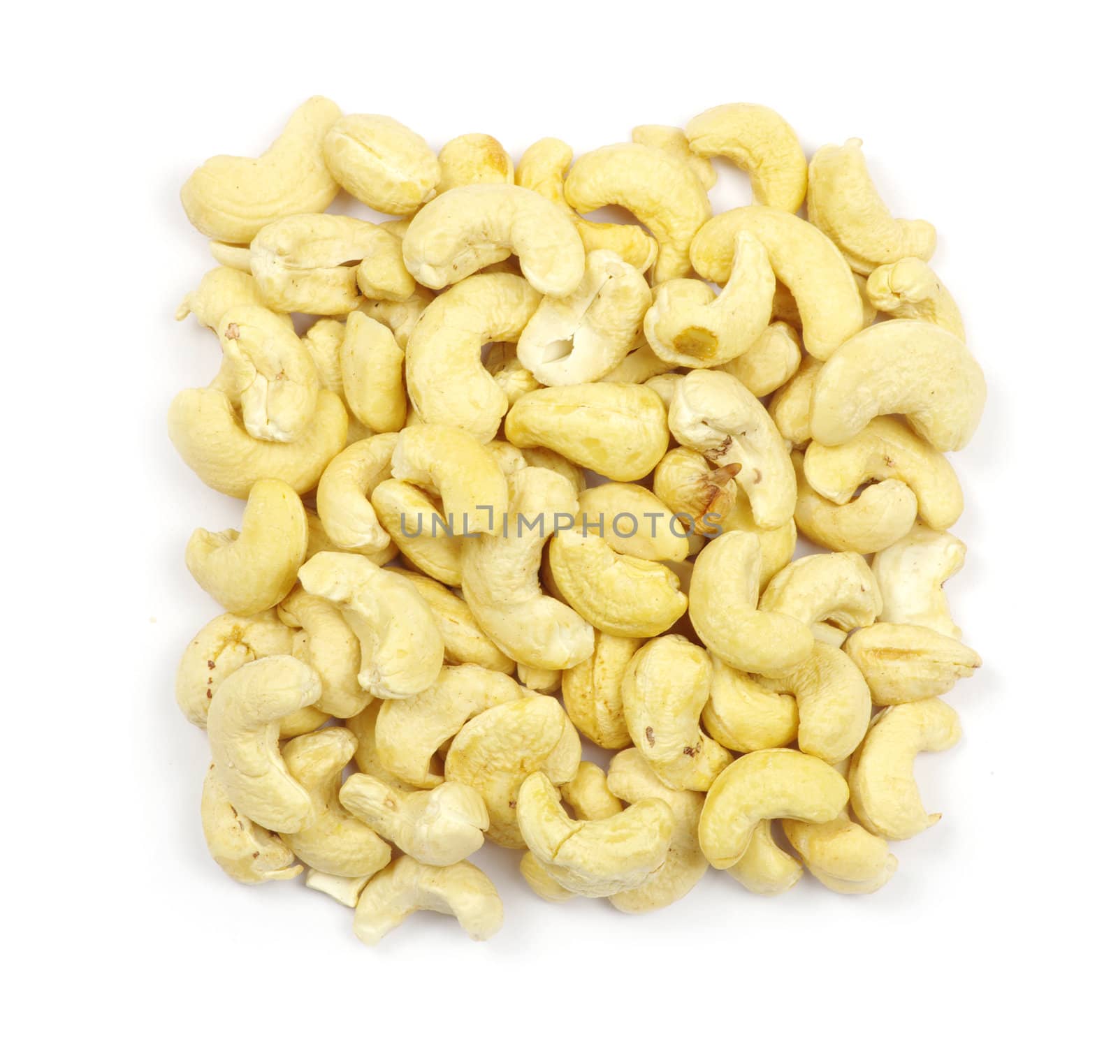 Pile of cashew nuts isolated on white 