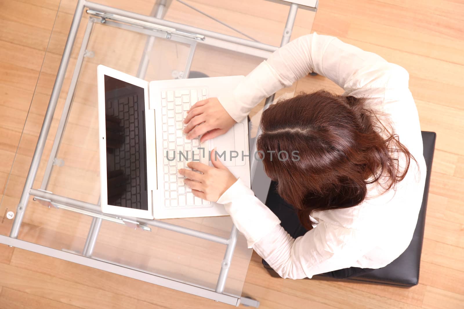 Business woman working on a Laptop.