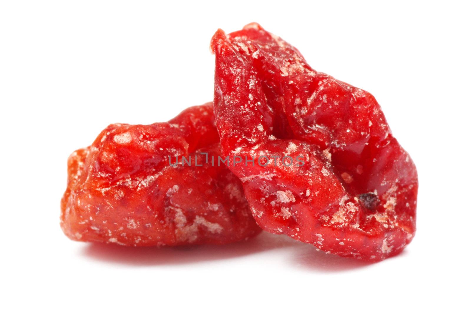 red dried goji berries on white