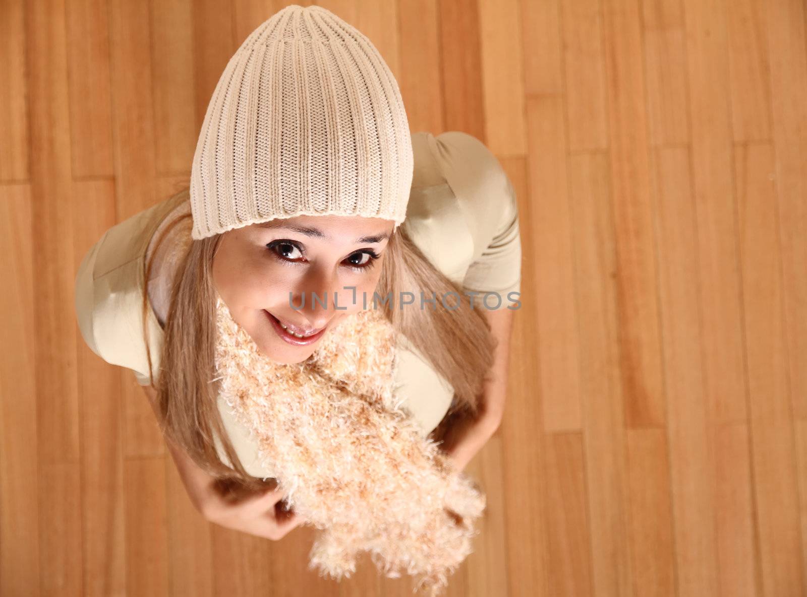 A young woman posing in winter clothing.