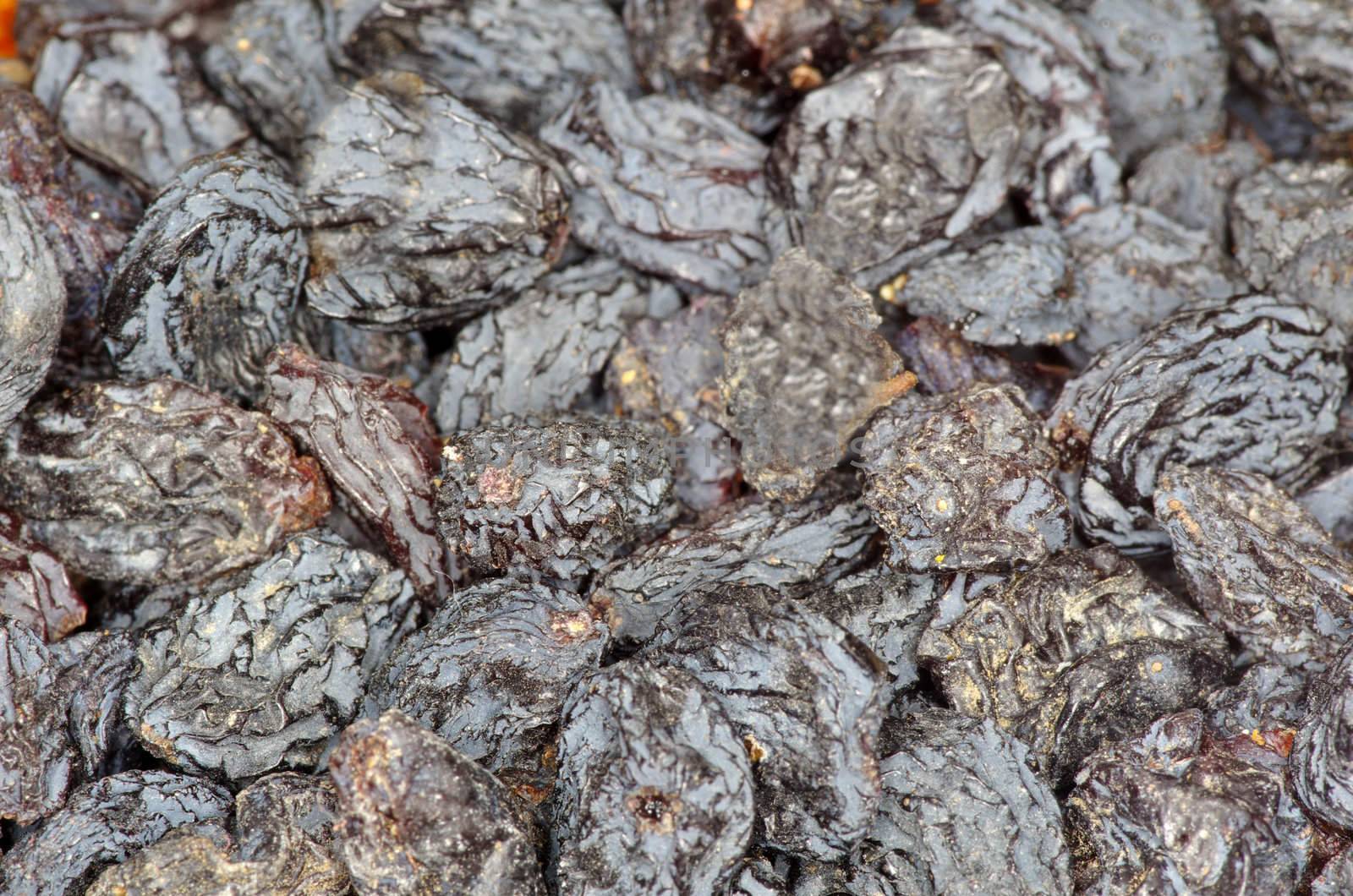 a closeup of dark brown raisins