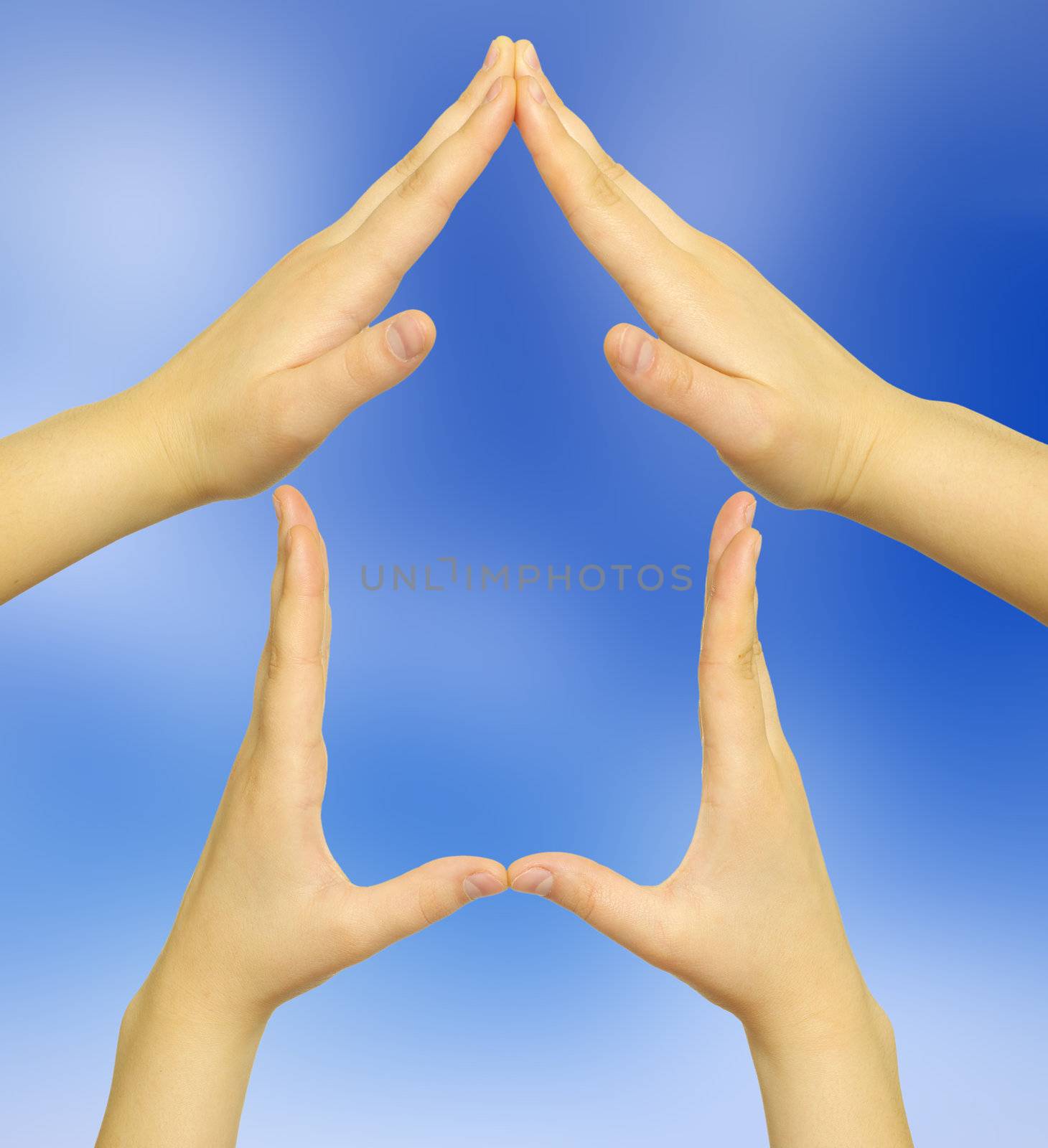House made of  woman hands isolated on blue