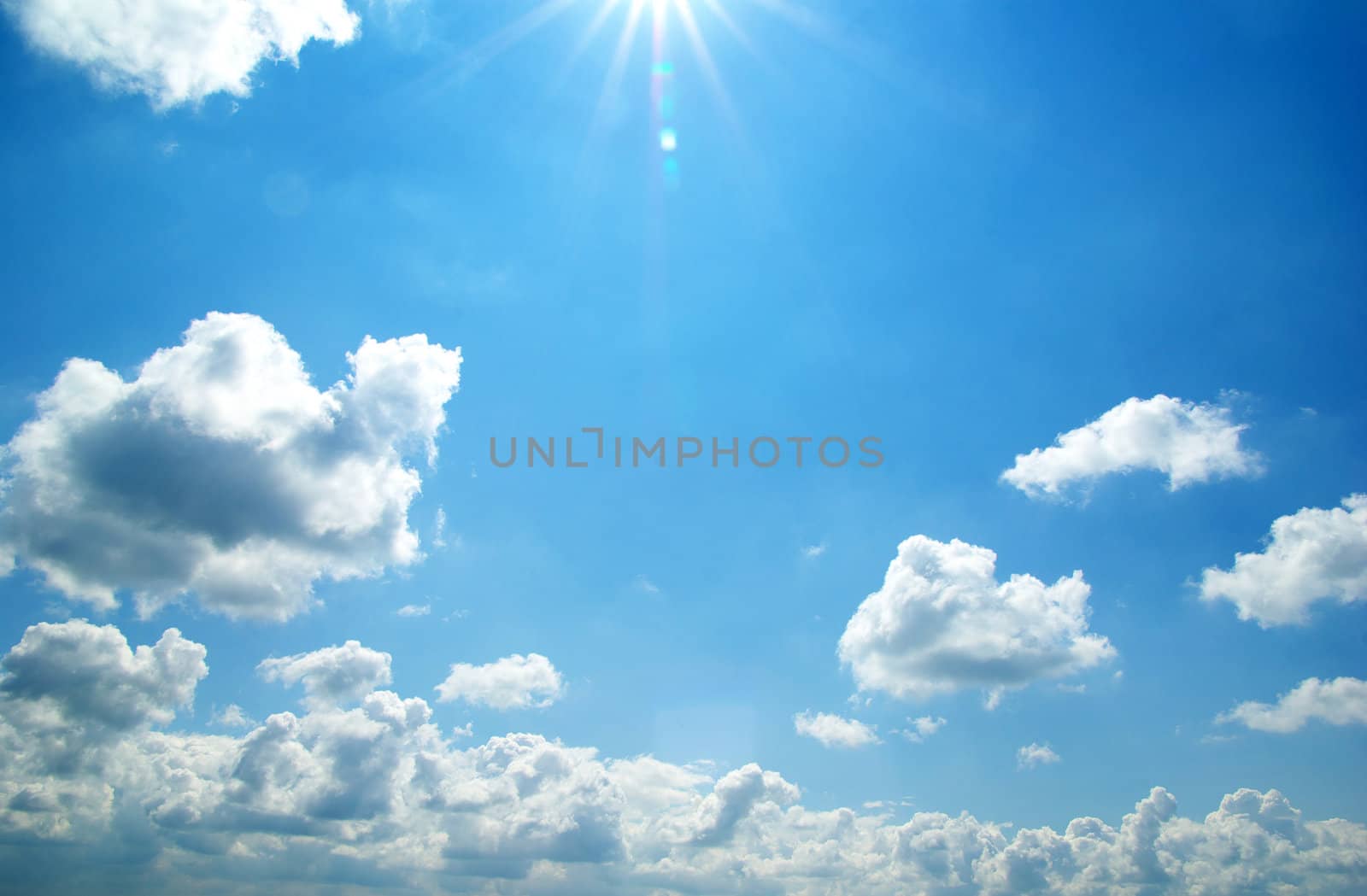 blue sky background with tiny clouds
