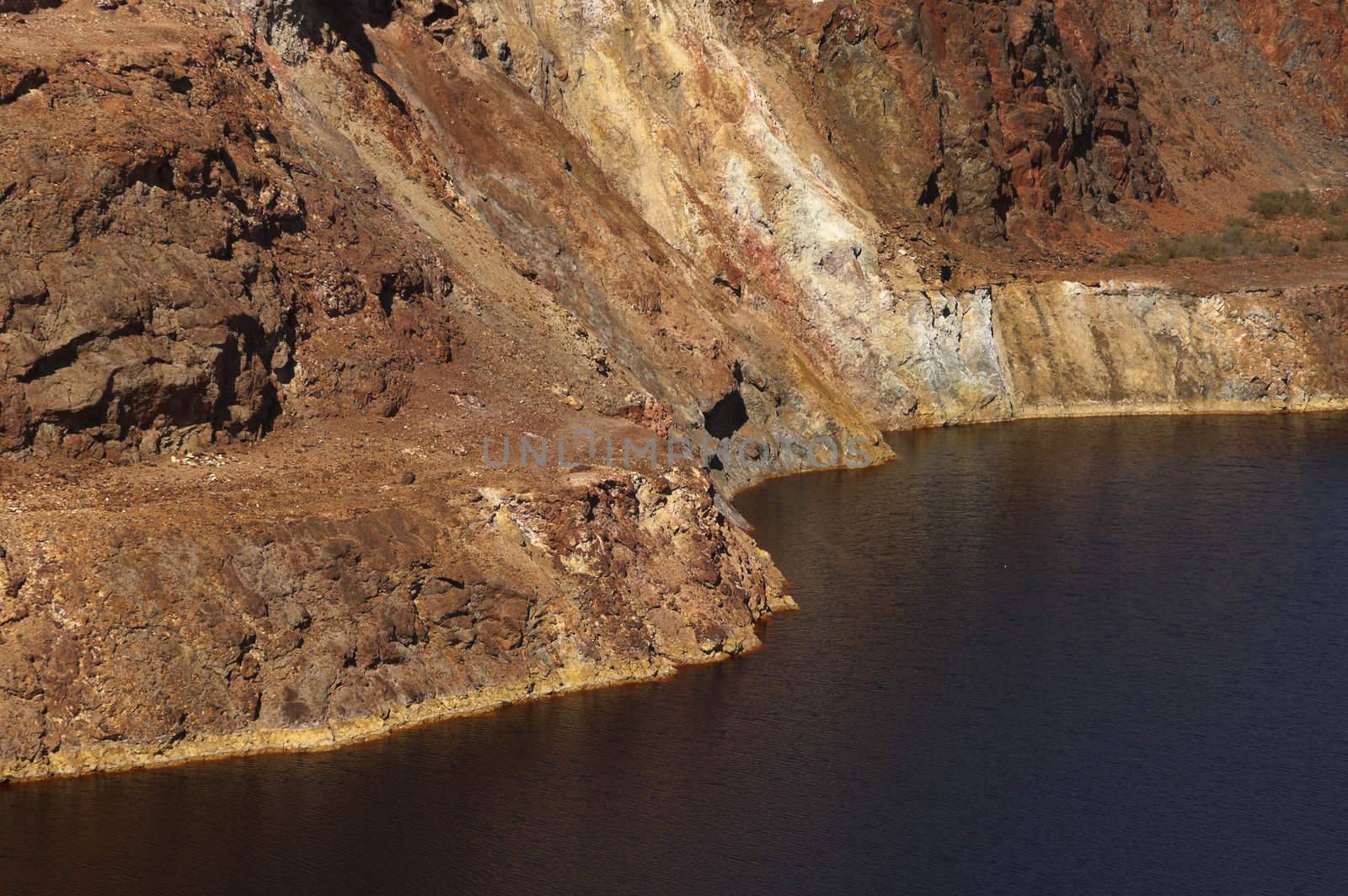 Detail of the São Domingos Mine, a deserted open-pit mine in Mertola, Alentejo, Portugal. This site is one of the volcanogenic massive sulfide ore deposits in the Iberian Pyrite Belt, which extends from the southern Portugal into Spain