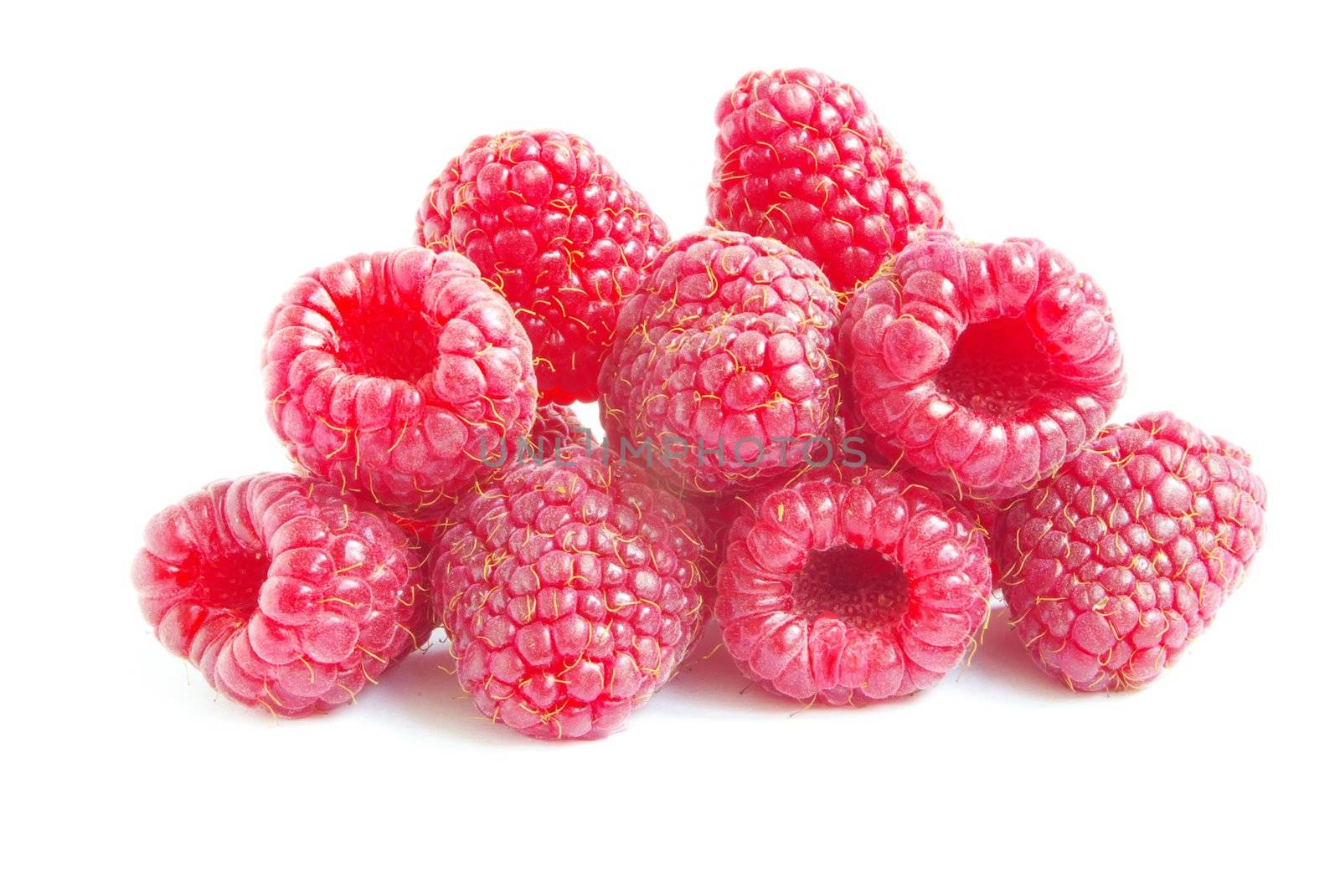Ripe raspberry isolated on a white background