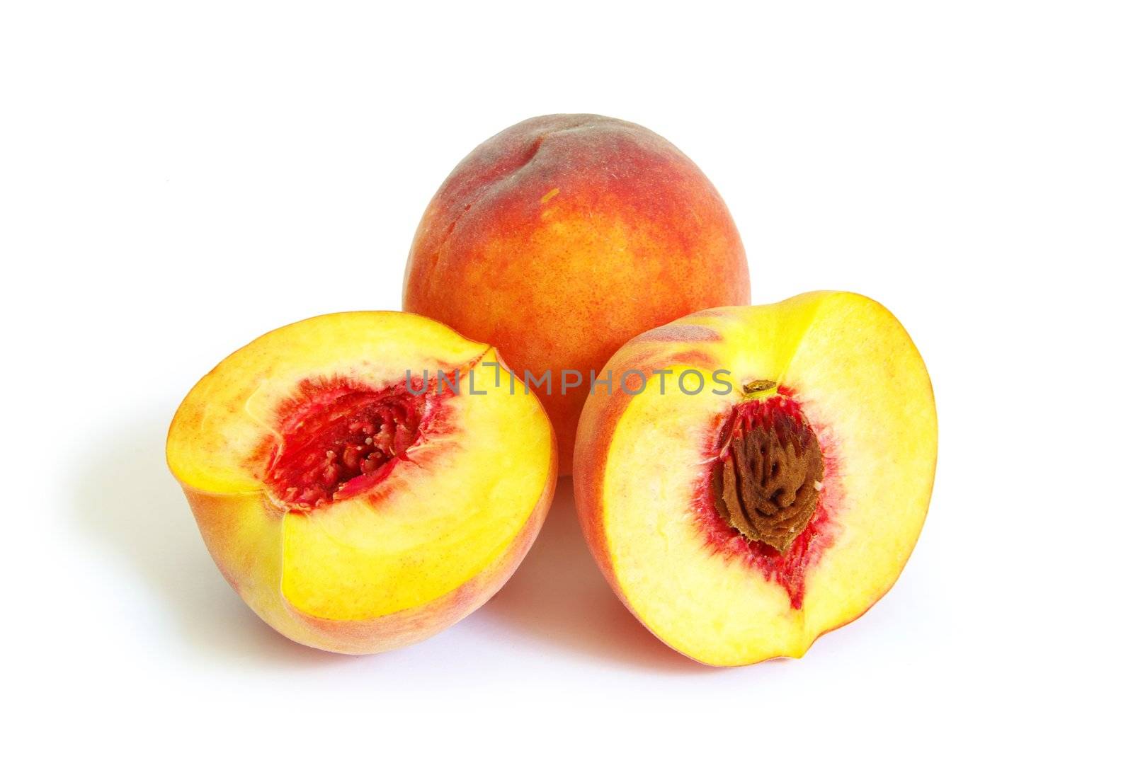 Fresh peach fruits isolated on white background