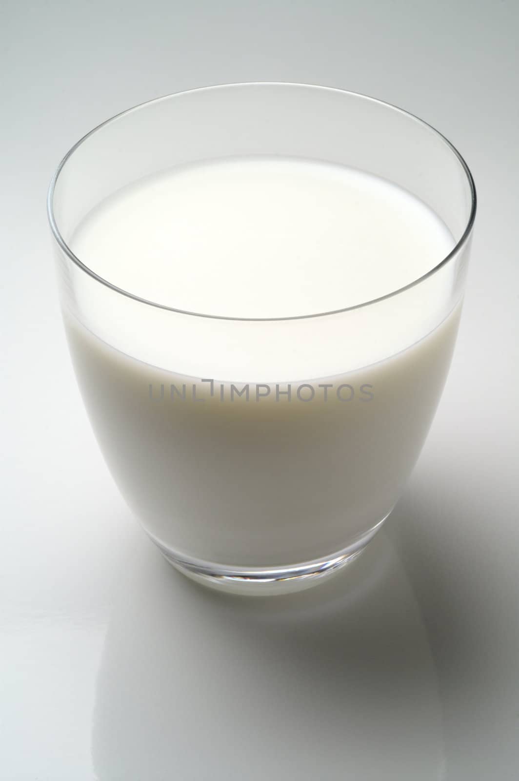 Glass of milk isolated in white background (w2) by Laborer
