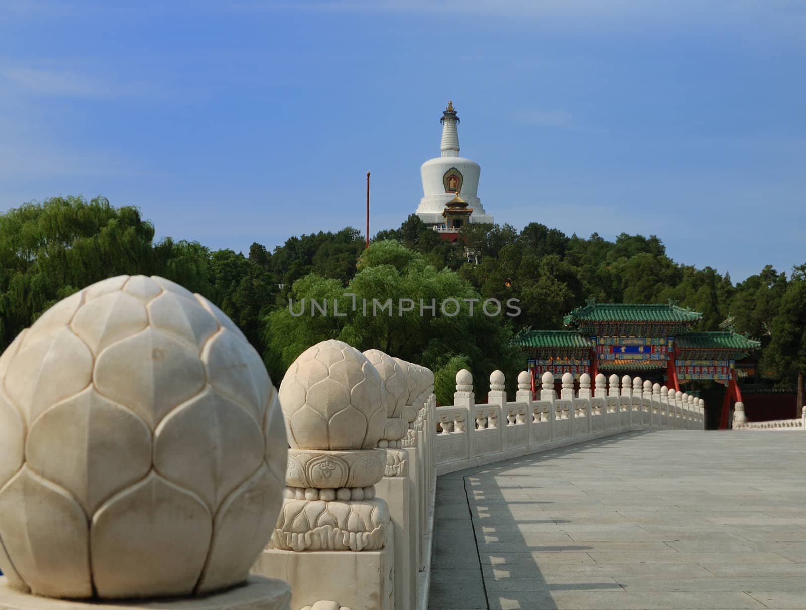 White pagoda in Beijing ancient park.