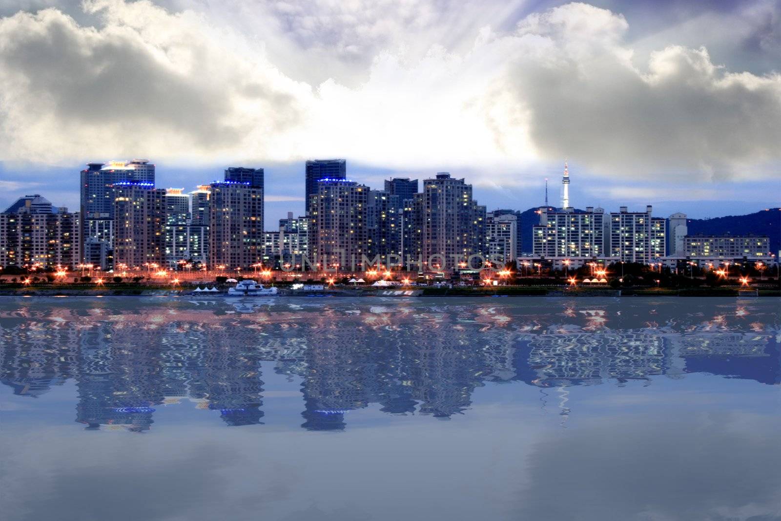 Seoul Skyline at Dusk with clouds still shining at low and high clouds