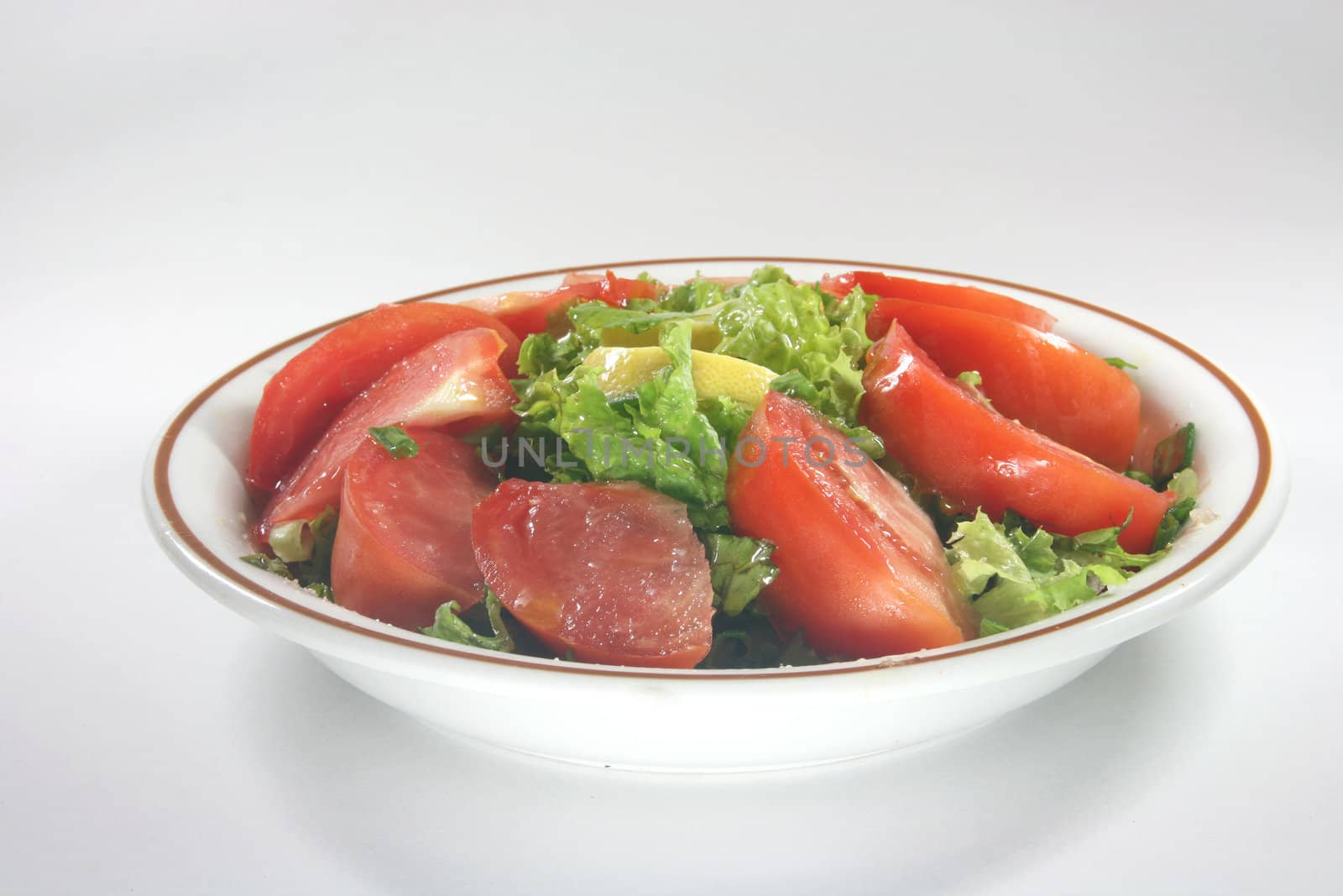 closeup salad with tomatoes and vegetables