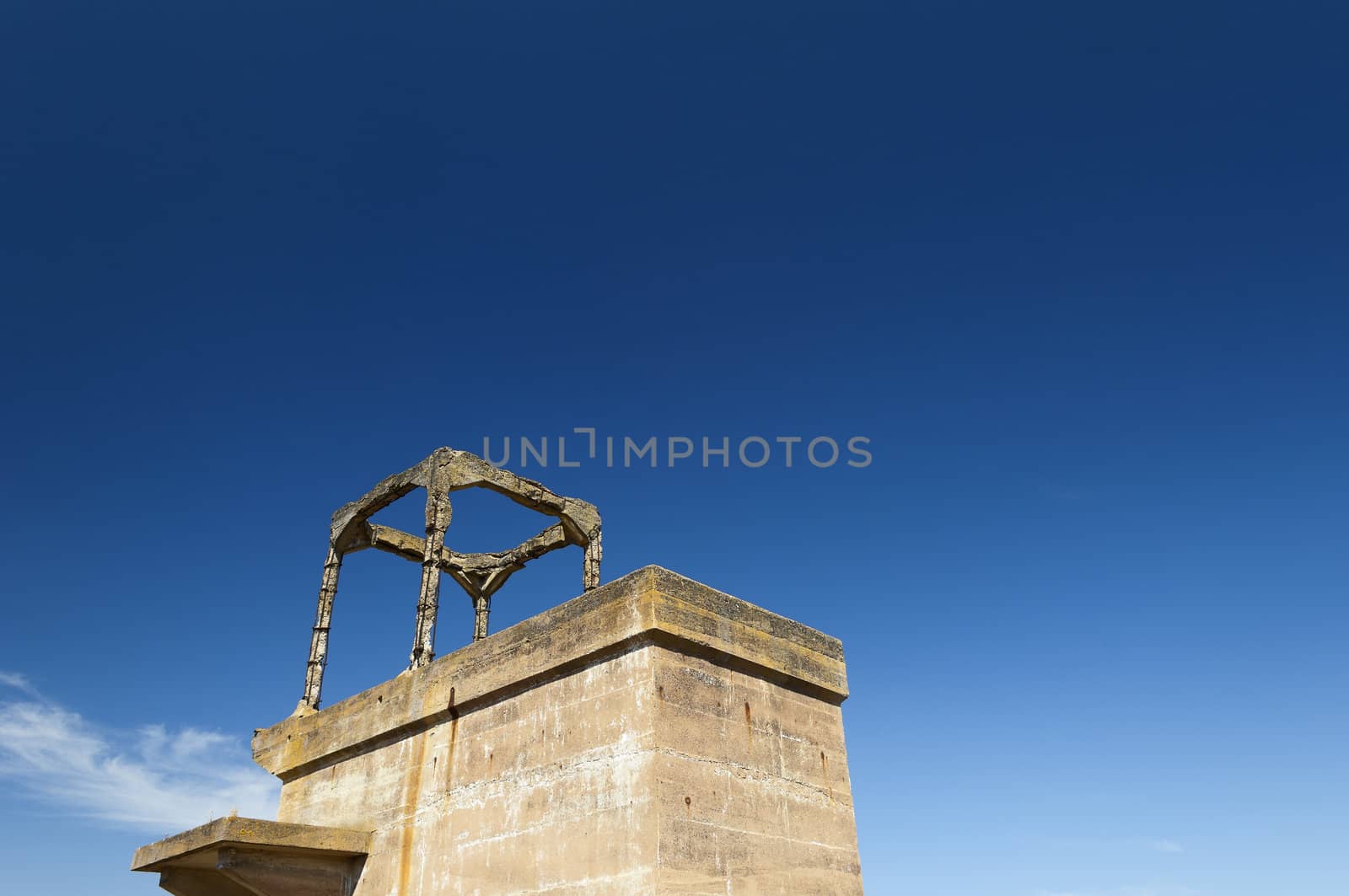 Damaged buildings in São Domingos Mine, a deserted open-pit mine in Mertola, Alentejo, Portugal. This site is one of the volcanogenic massive sulfide ore deposits in the Iberian Pyrite Belt, which extends from the southern Portugal into Spain