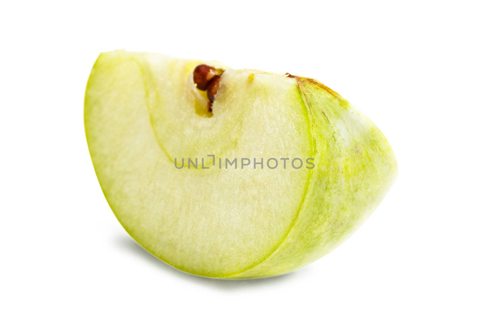 A section of big green apple over white background