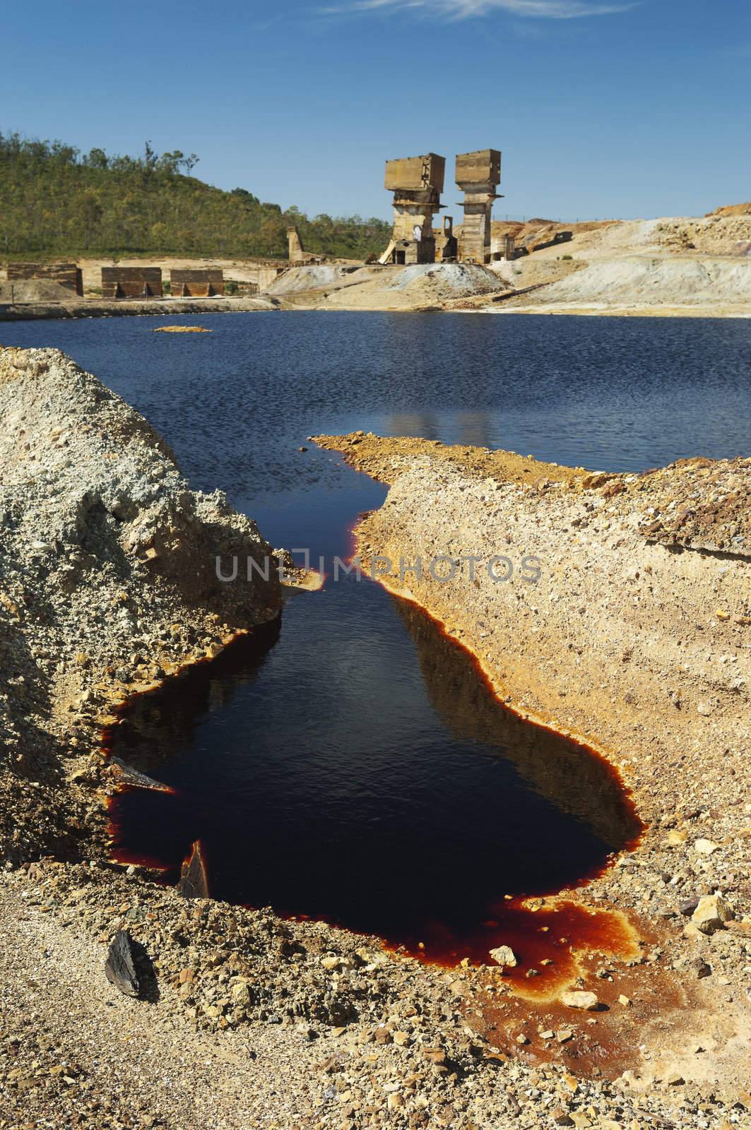 The São Domingos Mine is a deserted open-pit mine in Mertola, Alentejo, Portugal. This site is one of the volcanogenic massive sulfide ore deposits in the Iberian Pyrite Belt, which extends from the southern Portugal into Spain