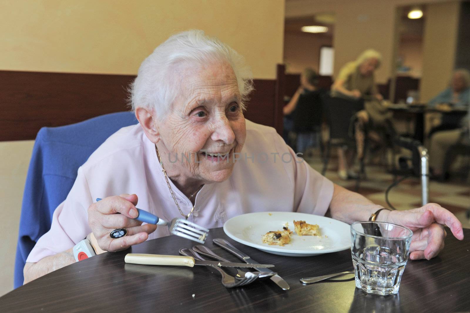 senior woman eating by cynoclub