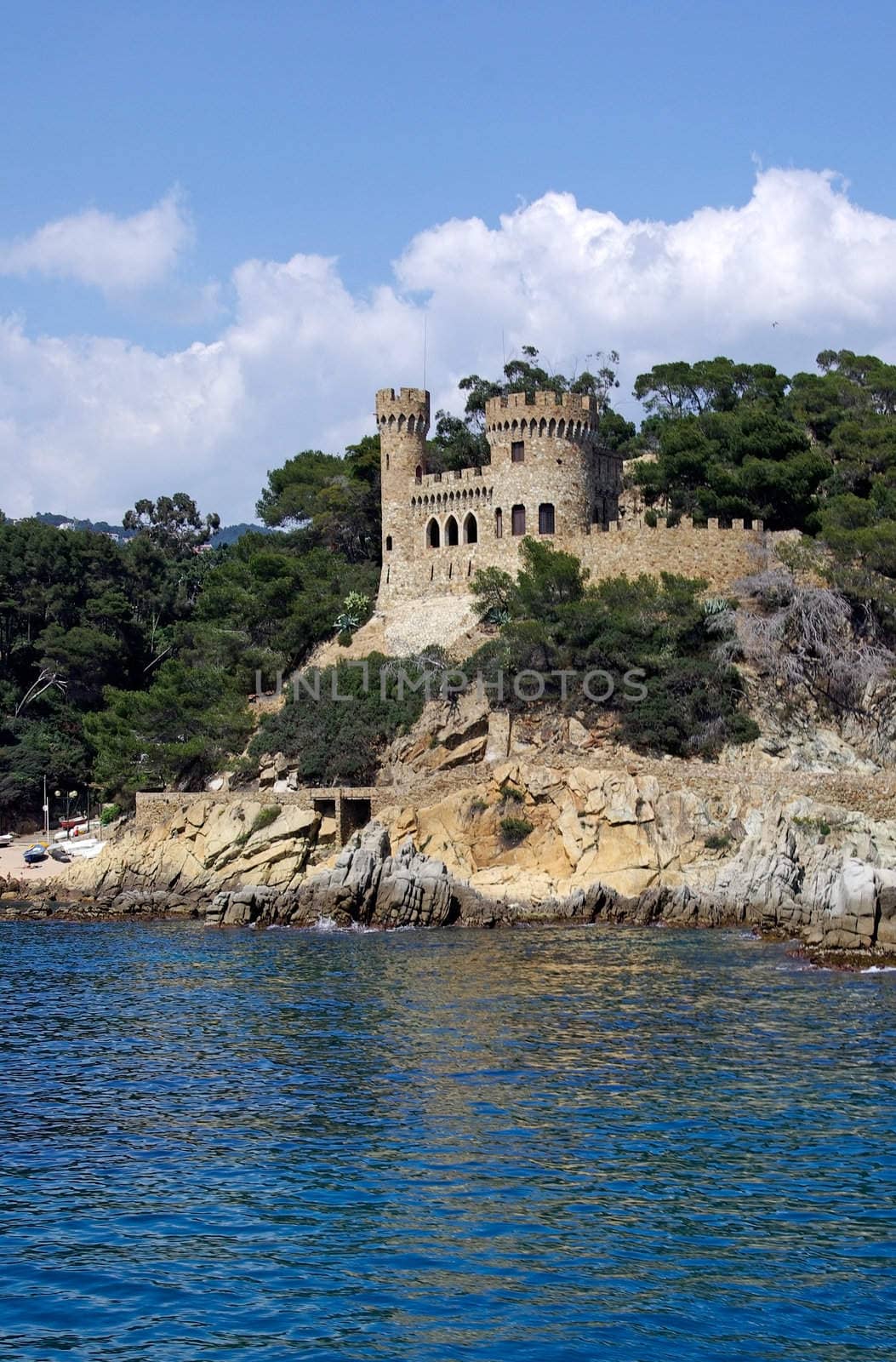 Landscape with castle view from sea in Lloret de Mar, Costa Brava, Spain.