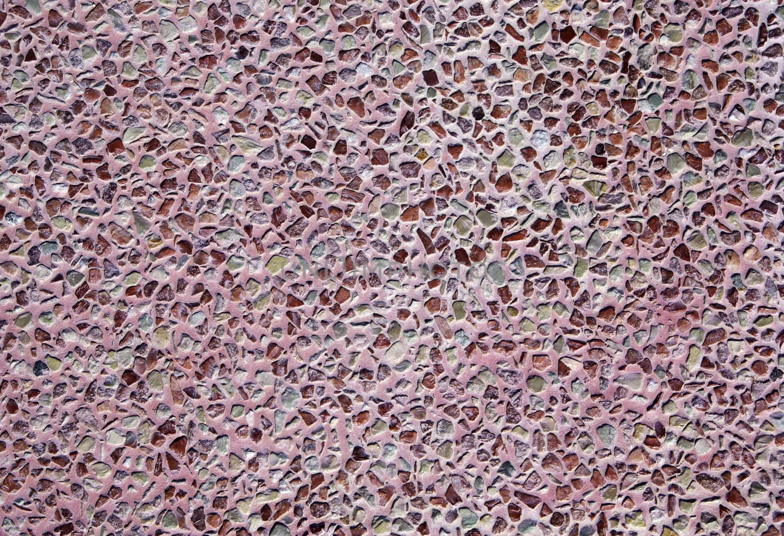 Pink mosaic tile as background or backdrop. Costa Brava, Spain.