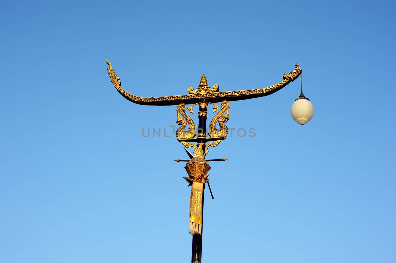 Thai style antique lamp with blue sky in north Thailand.