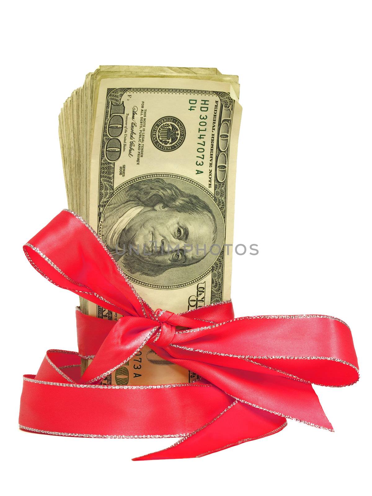 United States Currency Wrapped in a Red Ribbon as a Gift