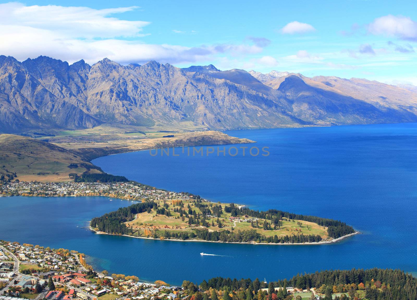 closeup of lake Wakatipu and Queenstown golf course garden island, New Zealand