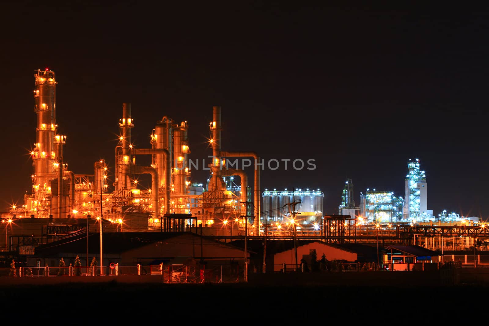 landscape of  petrochemical oil refinery plant at night