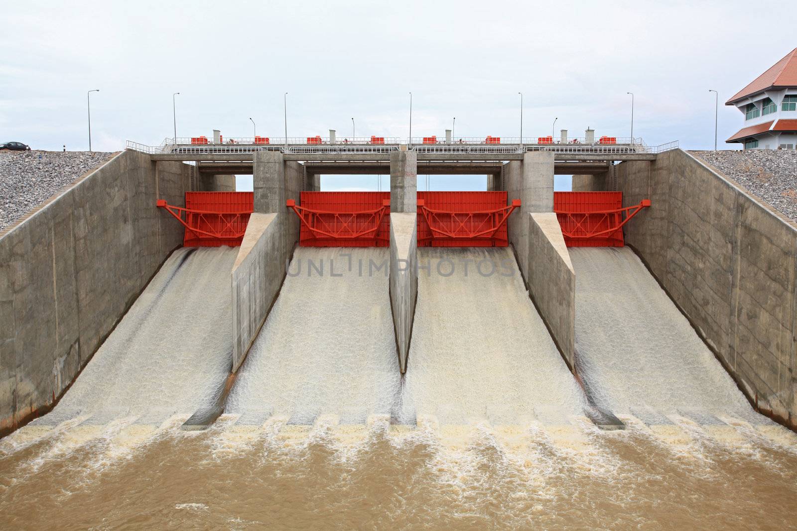 close up of Water pouring through the water gates at dam