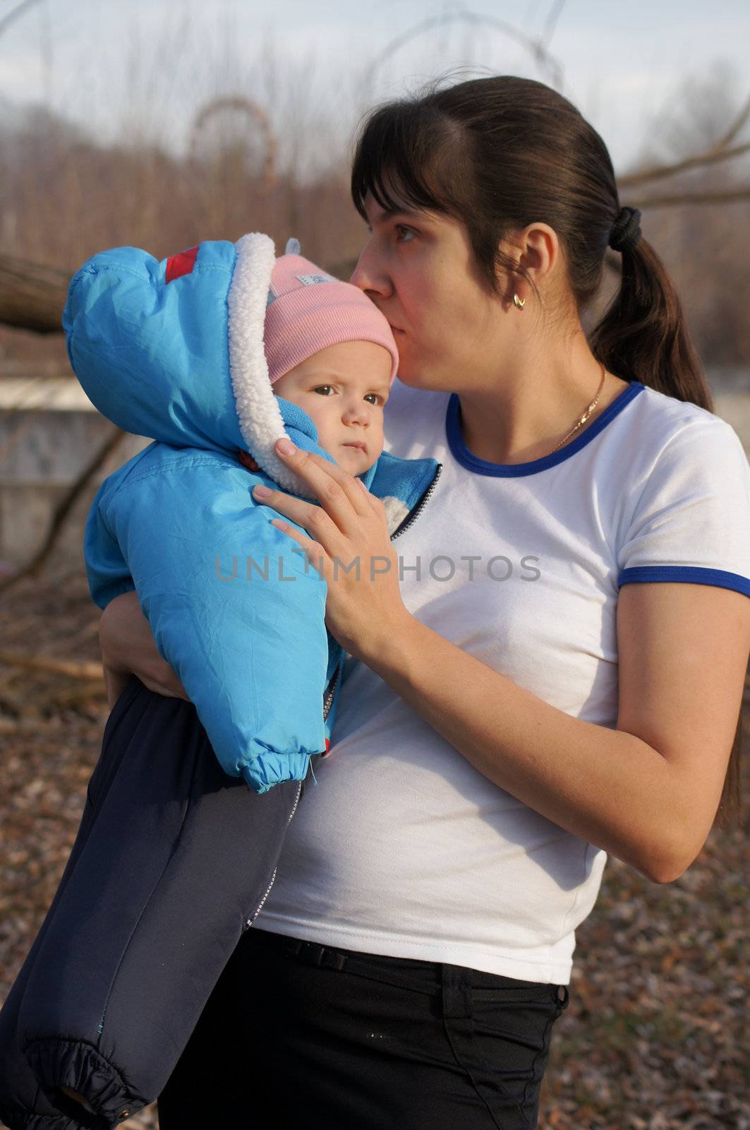 Young mother walks in the park with your child by Viktoha