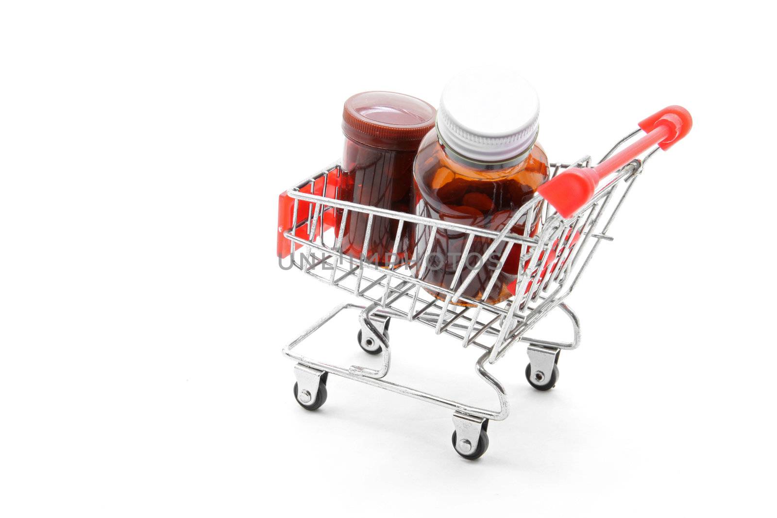 pill bottle in shopping cart trolley