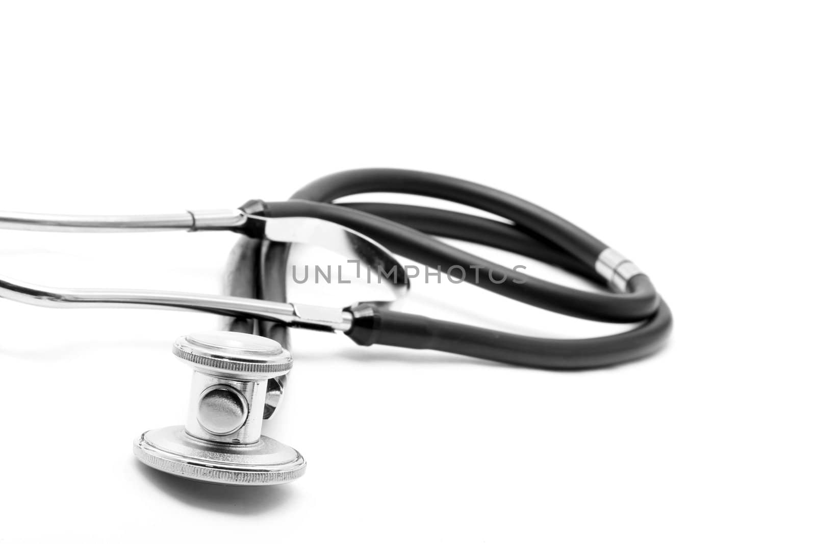 perspective of stethoscope on white background (focus at front)