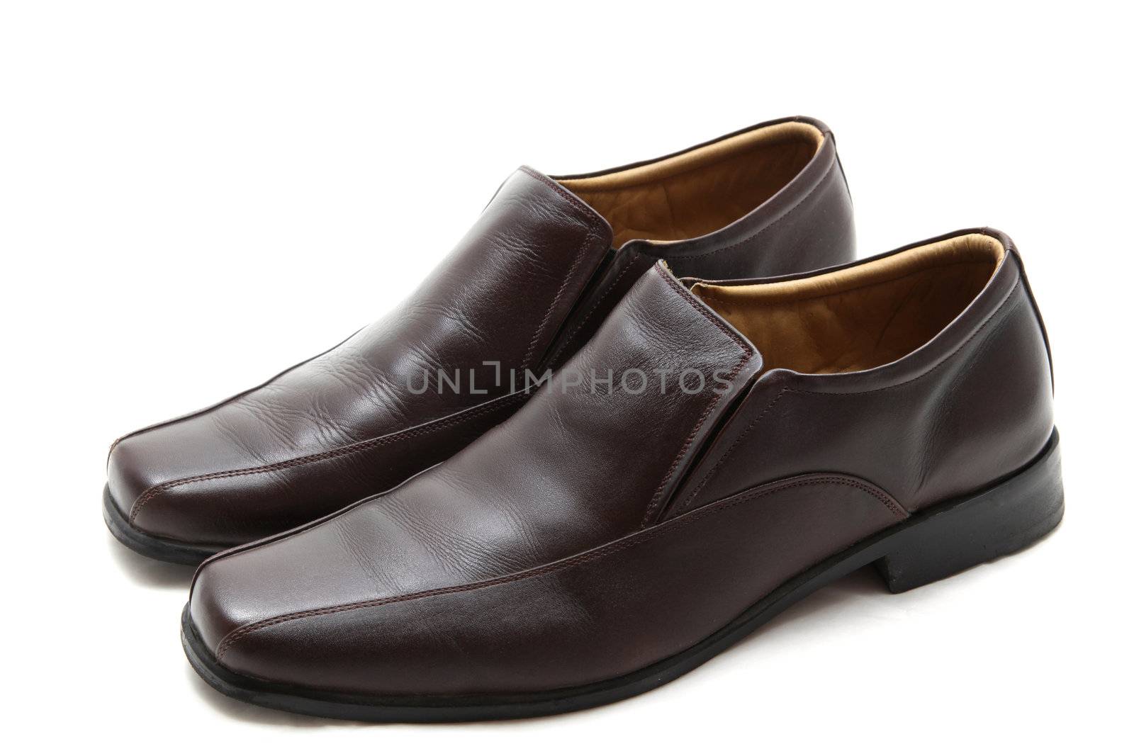 pair of luxury brown leather man shoes on a white background