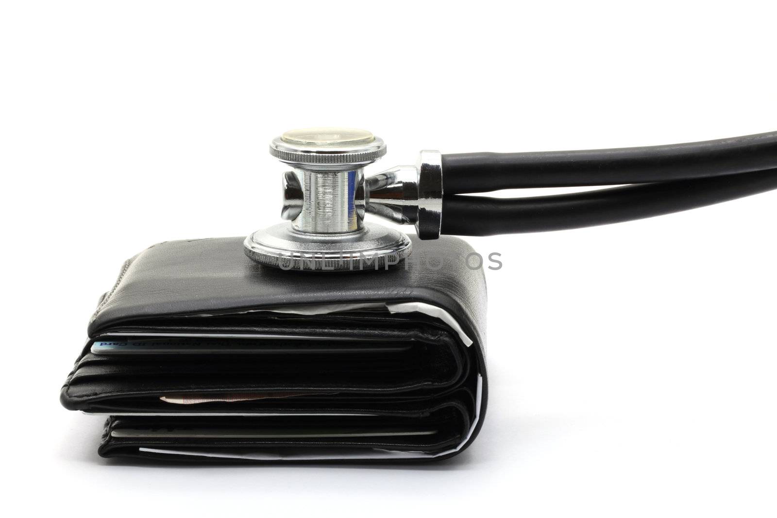 diagnose finance situation with stethoscope and cash wallet