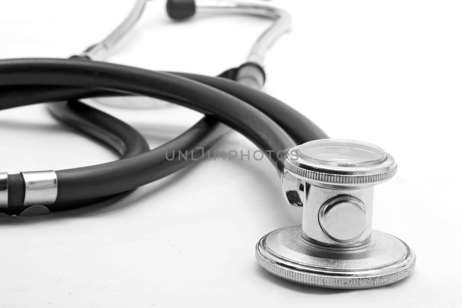 perspective of stethoscope on white background (focus st front)