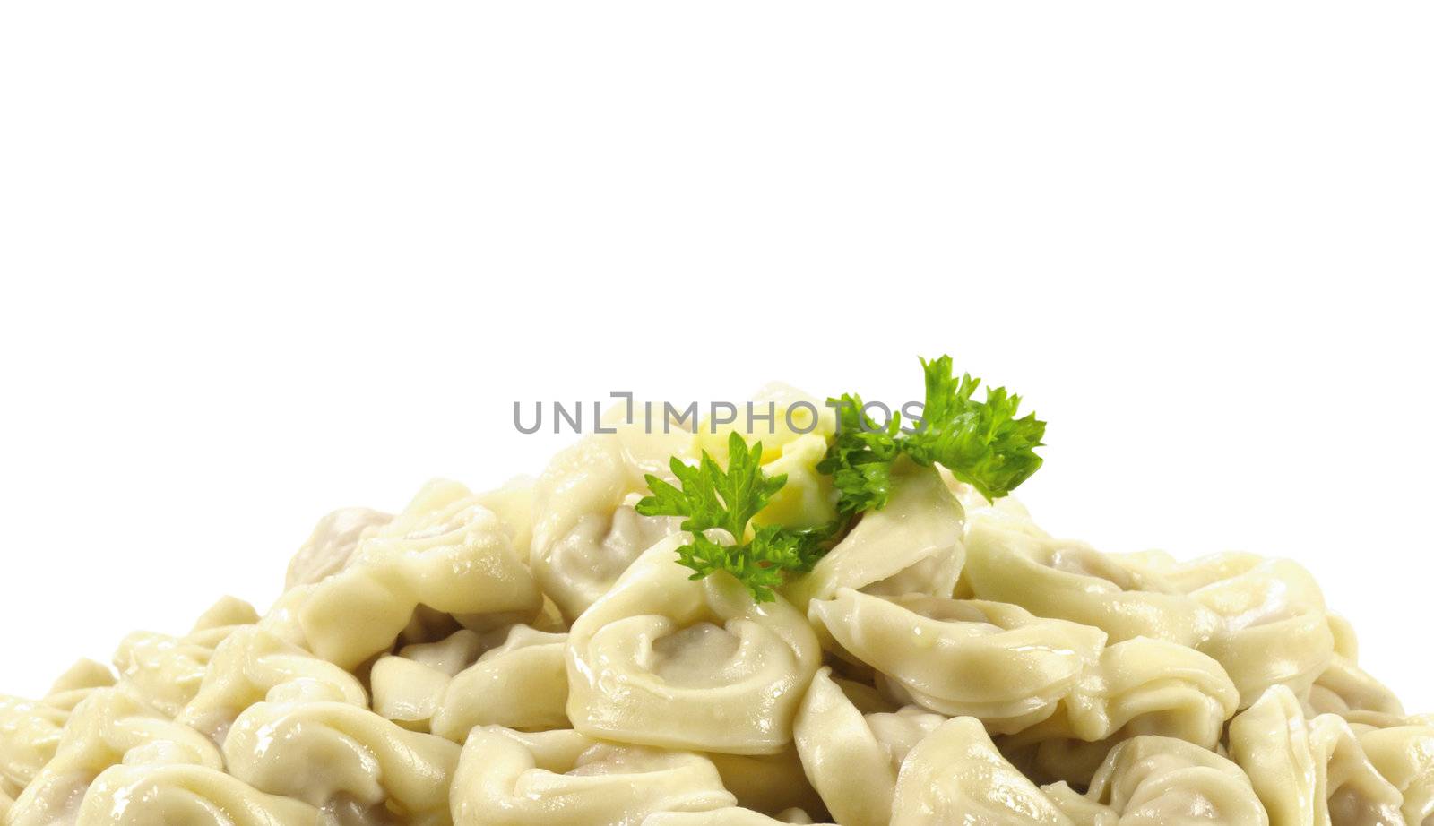 Bowl with traditional russian dish - pelmeni on the white