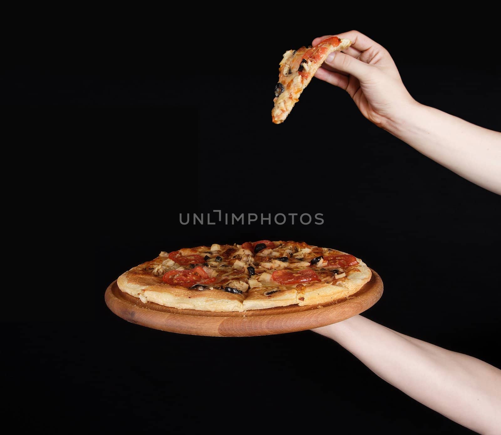 Tasty pizza and hand