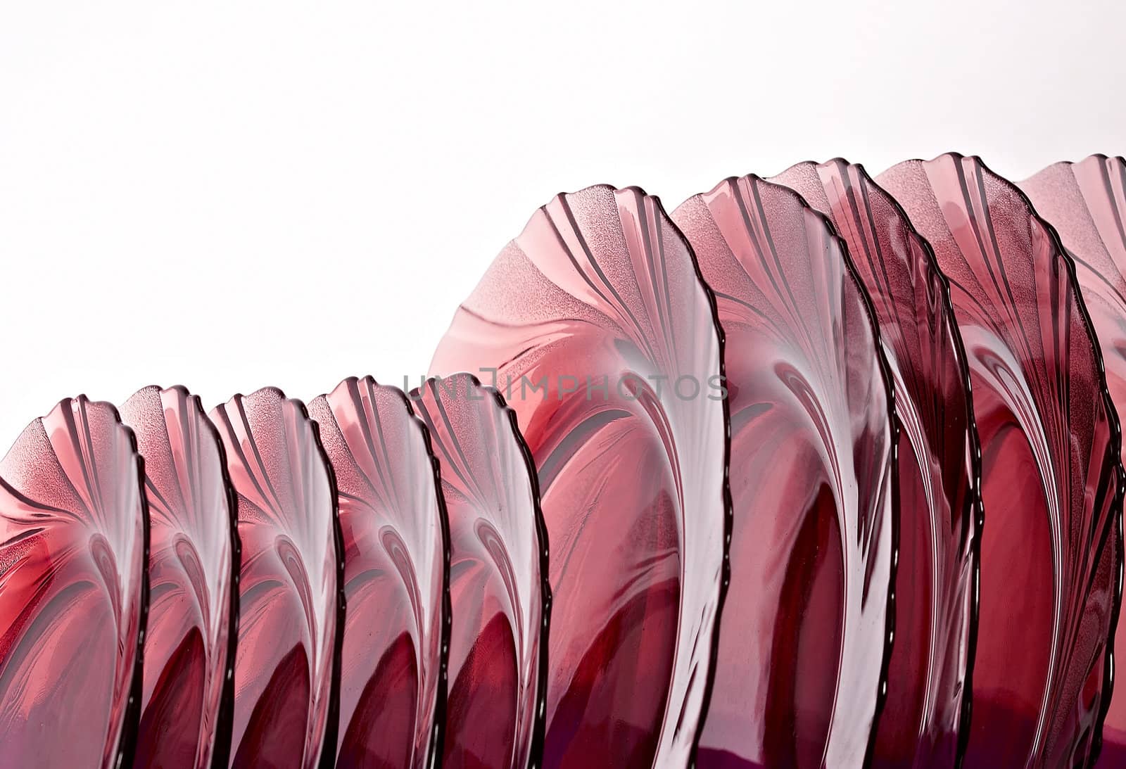 red glass dishes isolated on white background