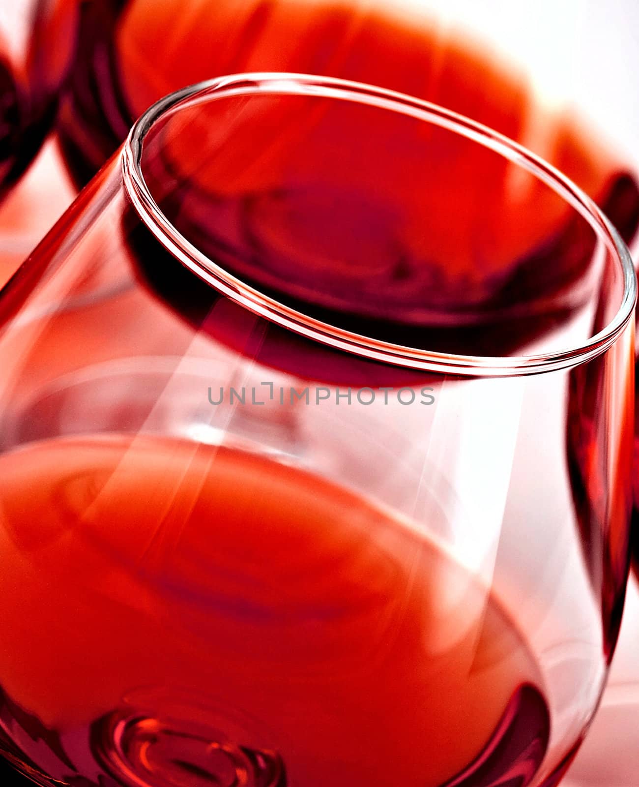 red wine in glass close up as background