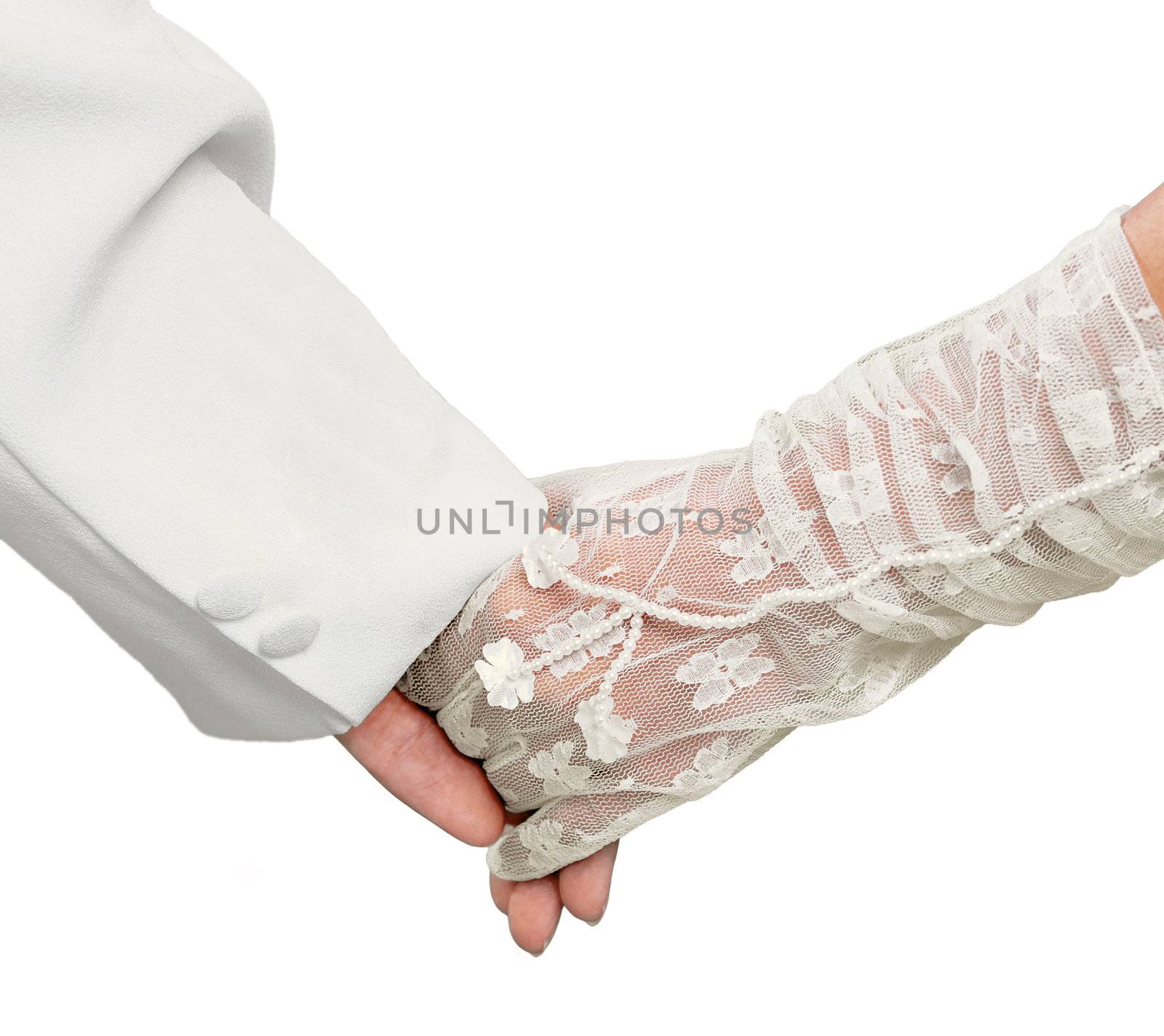 Just married couple holding hands on white