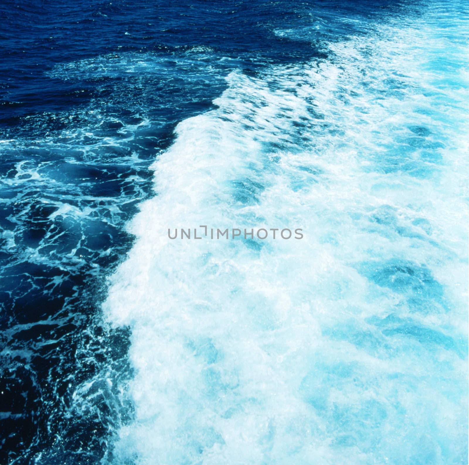 Reflection in sea water surface close up