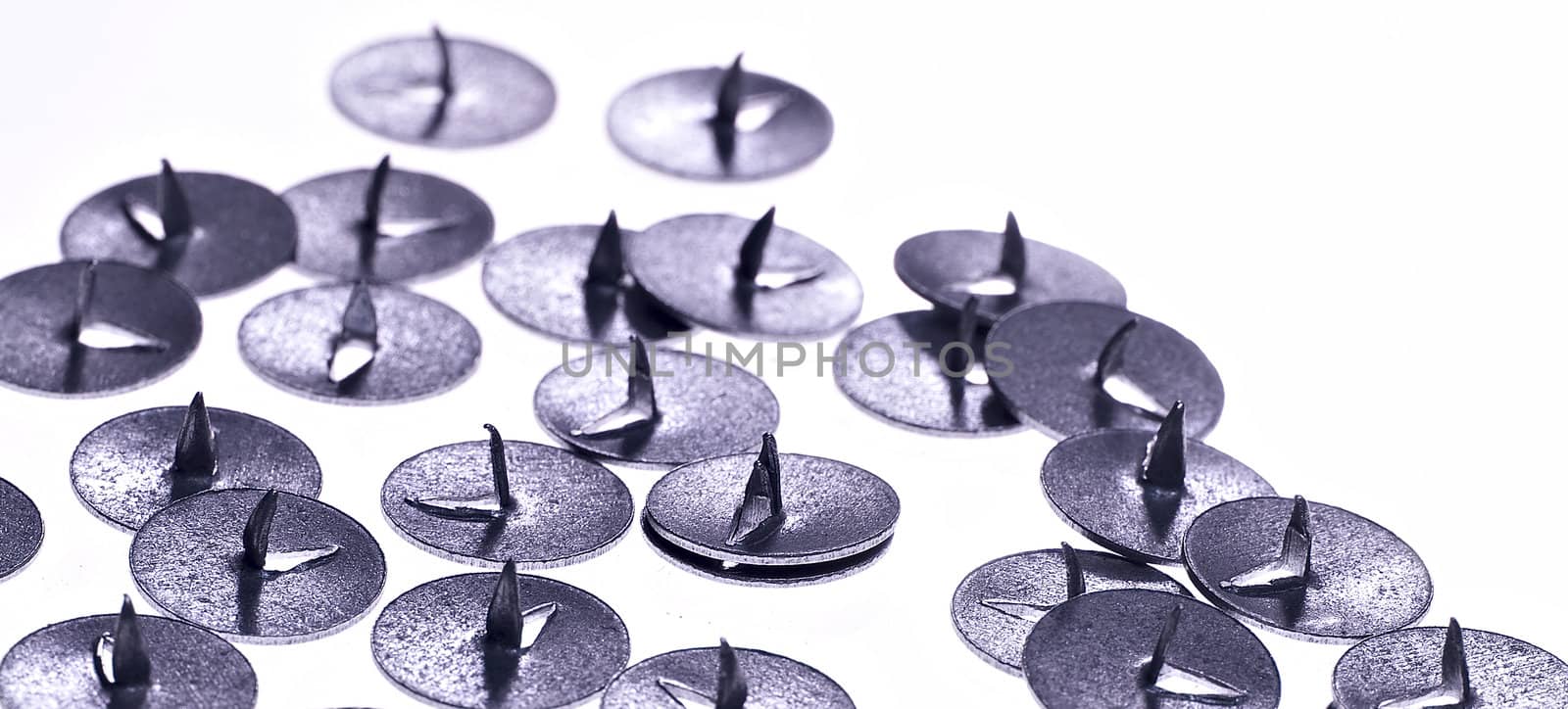metall push pins isolated on white background