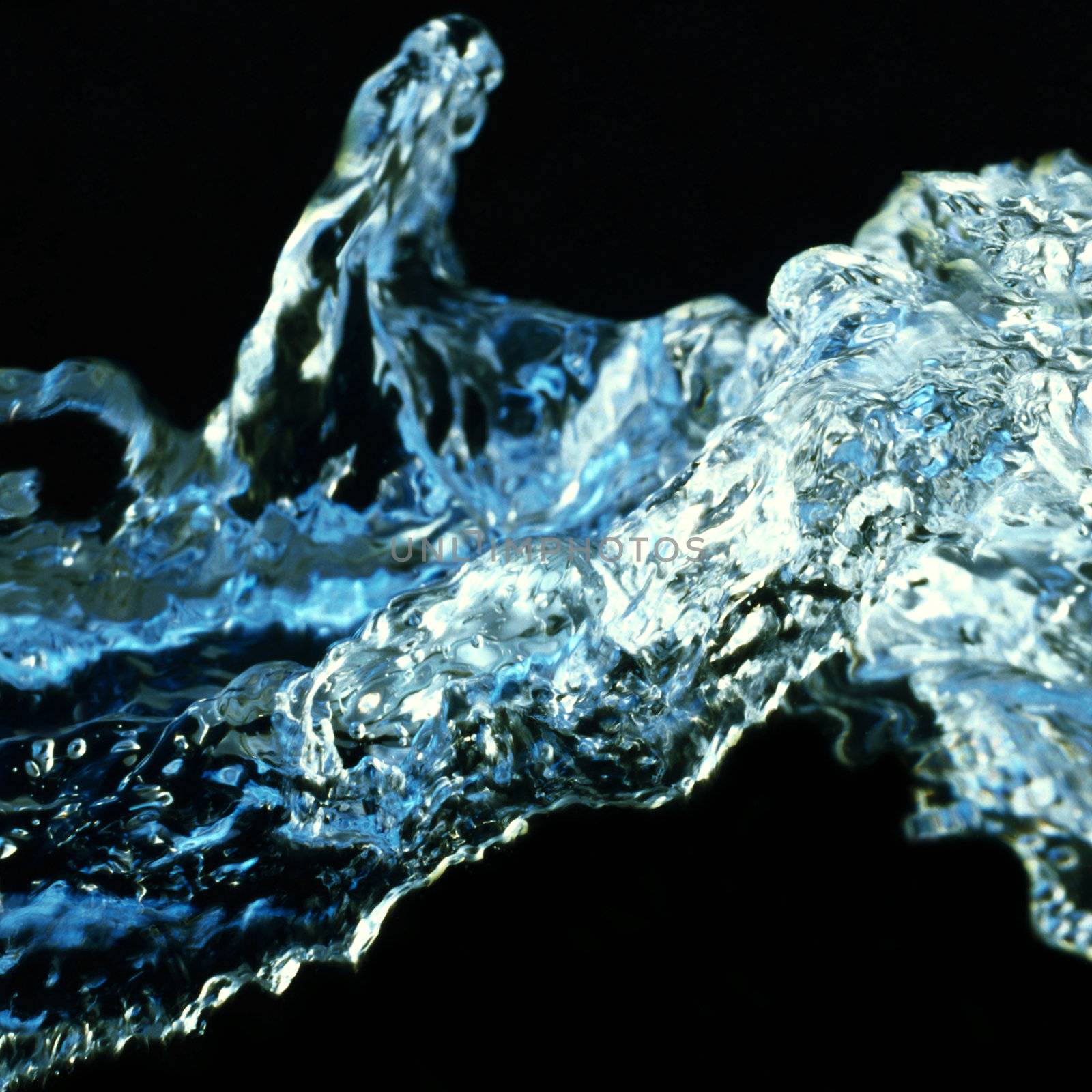 Photo of water splash isolated on black