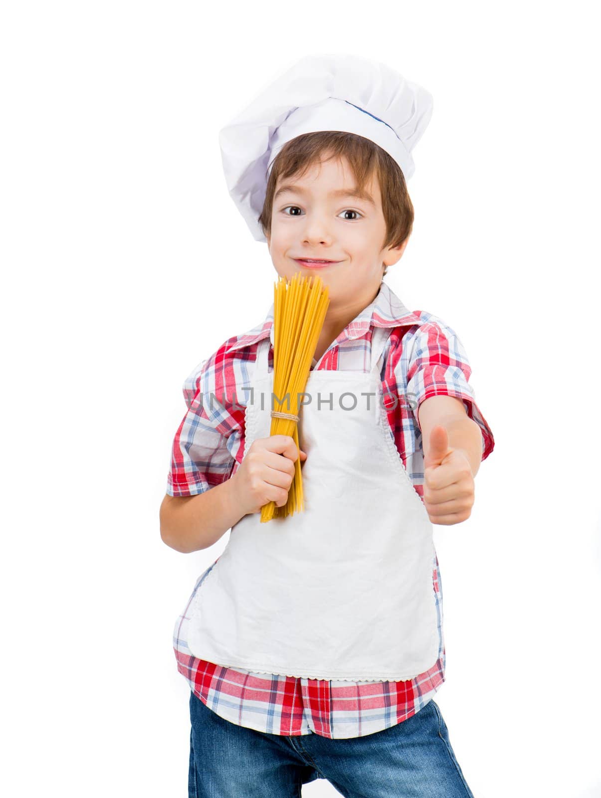 little boy with raw spaghetti with thumbs up