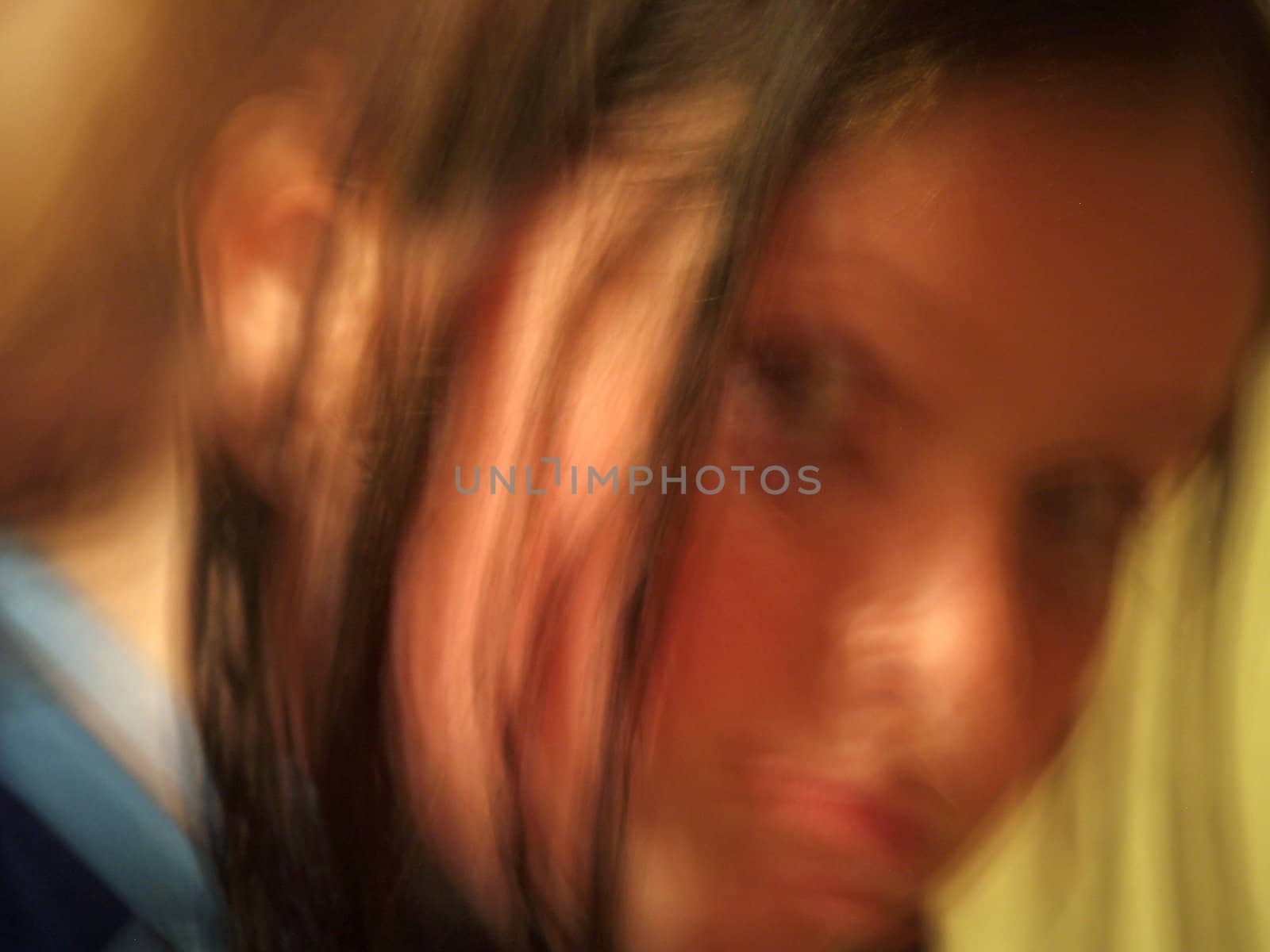 A motion blurred portrait of young girl