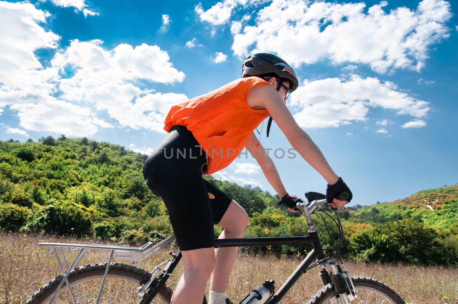 Mountain Biker and blue sky background