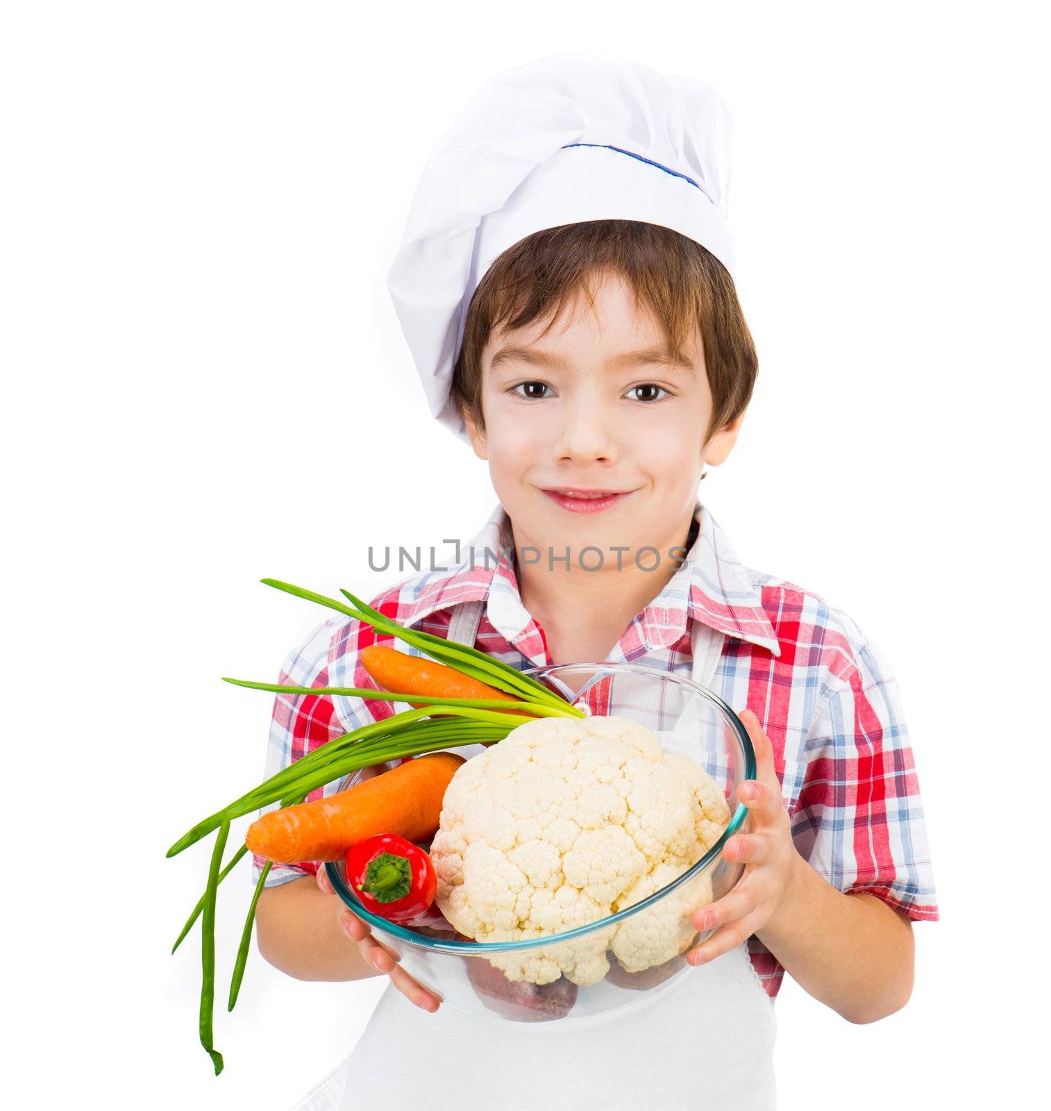 smiling boy with vegetables isolated on a white background