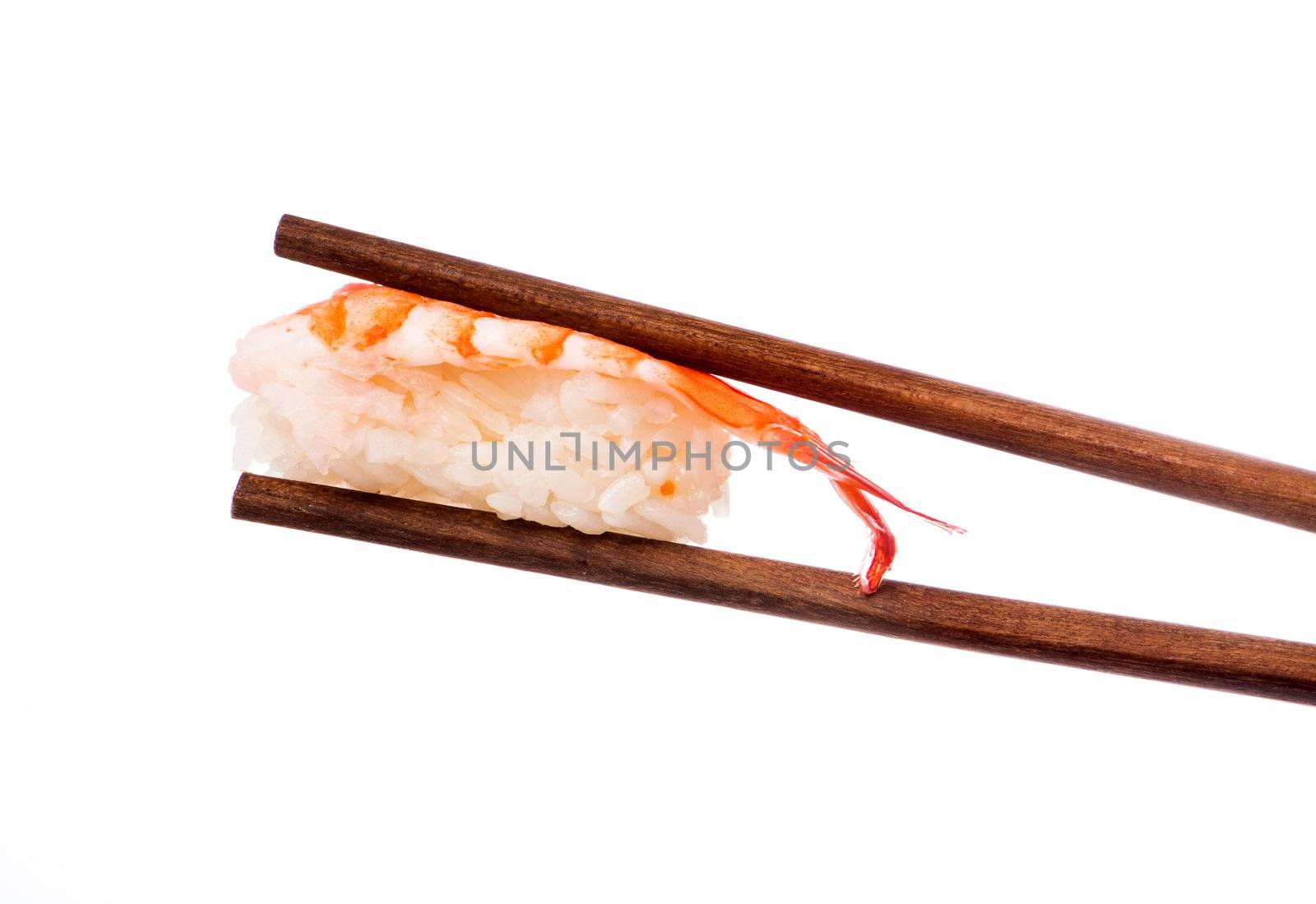 Sushi in chopsticks isolated on a white background