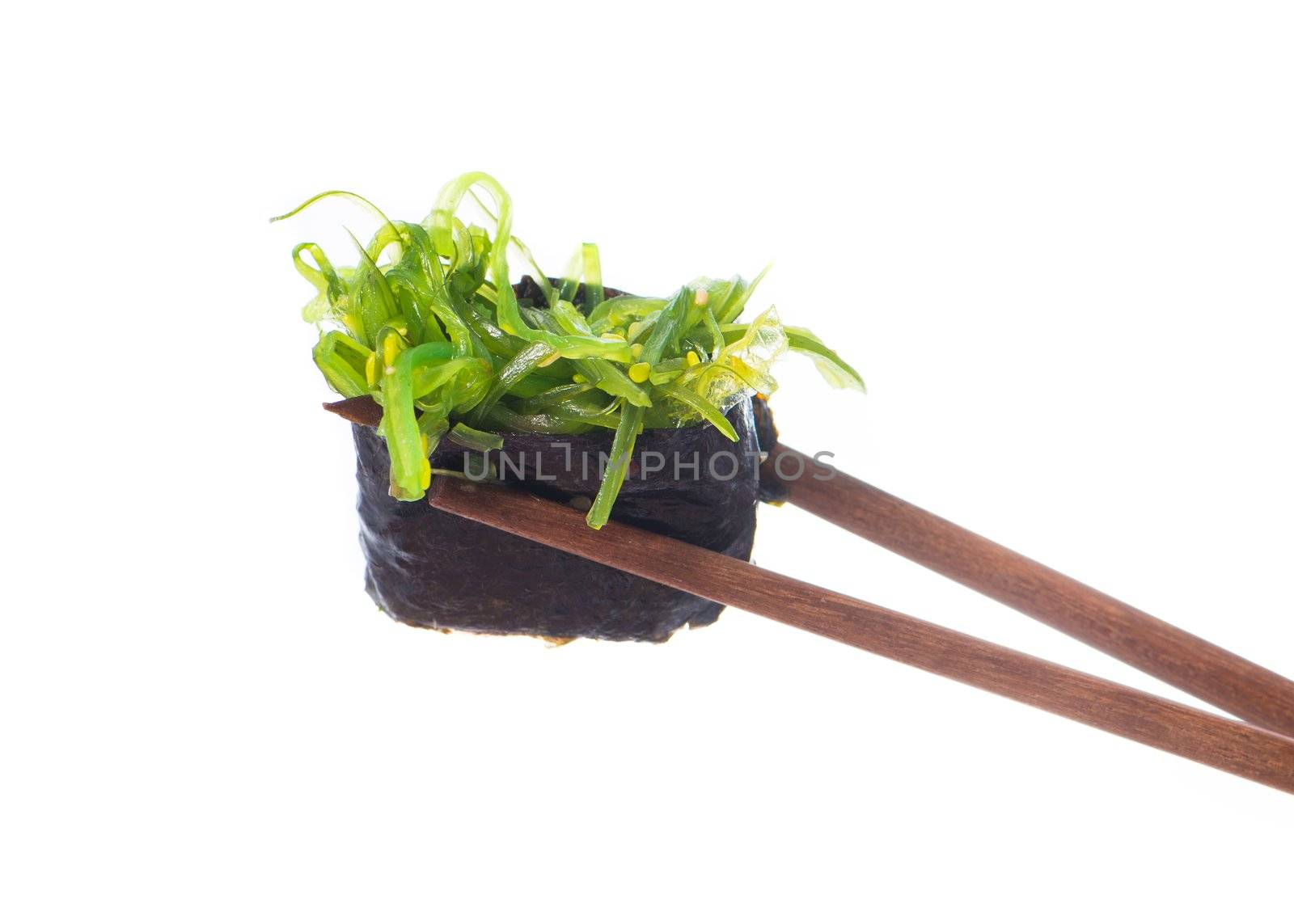 Sushi in chopsticks isolated on a white background