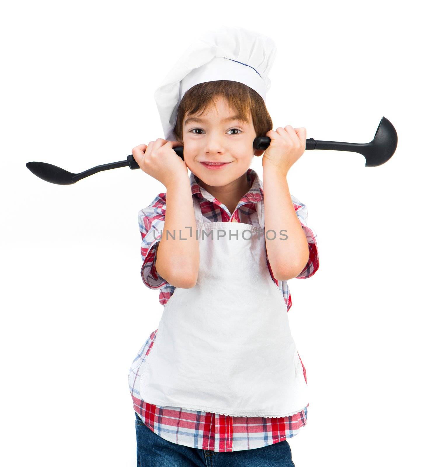 smiling boy with black spoons isolated on white background