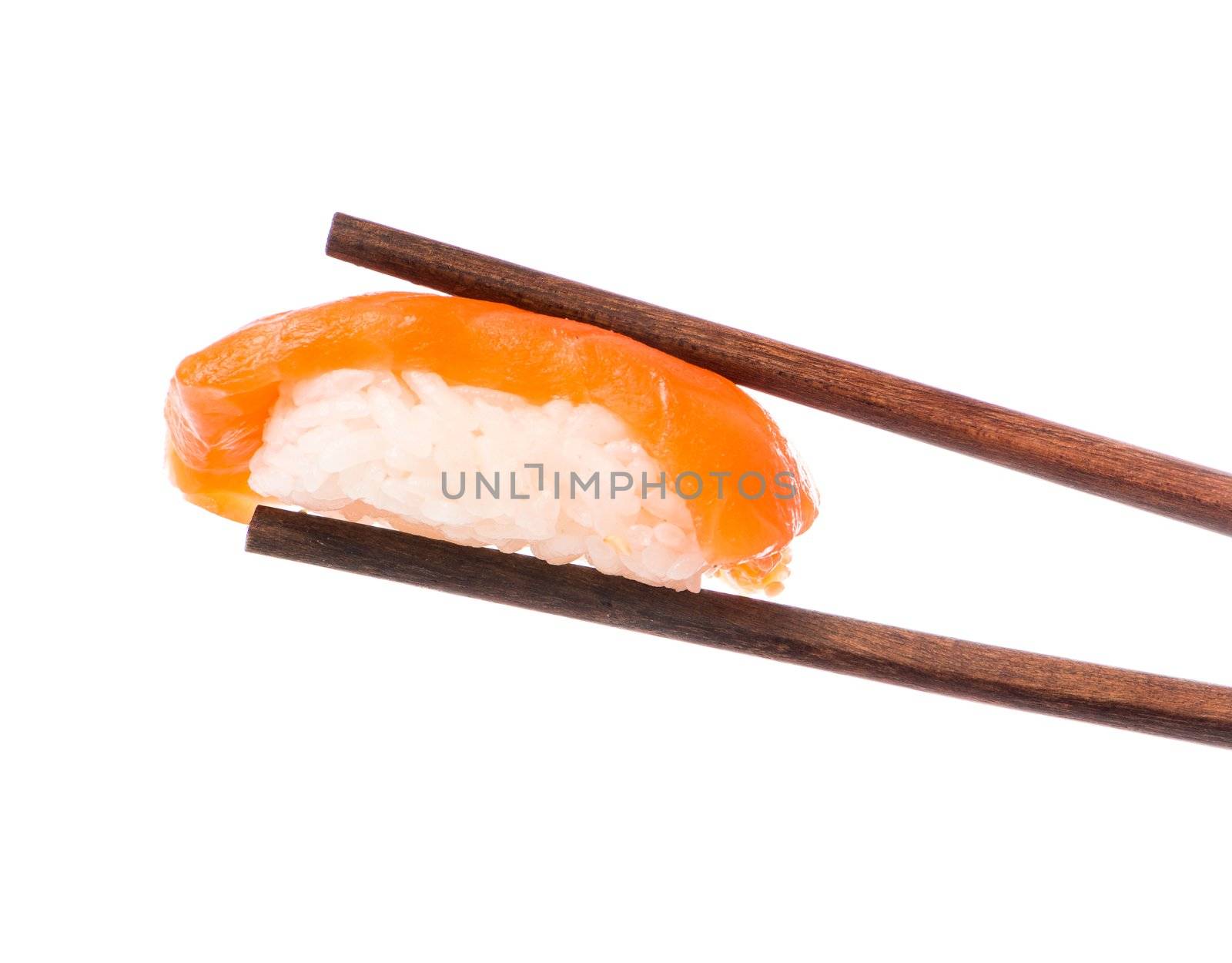 Sushi in chopsticks isolated on a white background