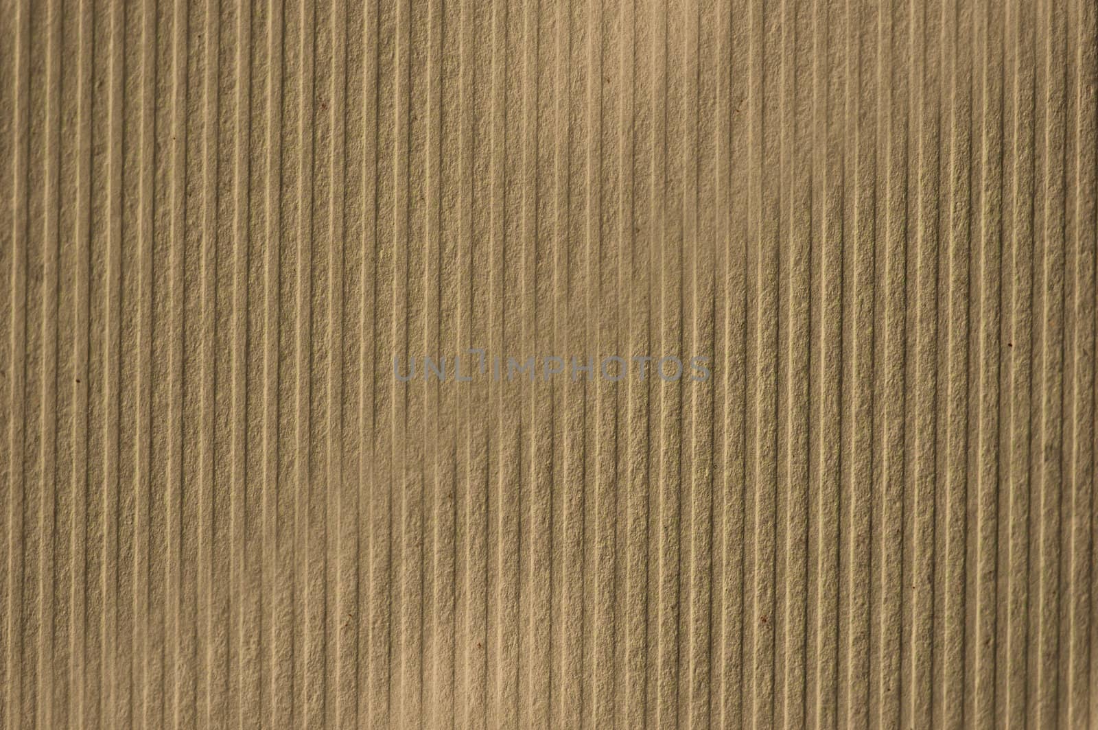 Recycled striped cardboard paper macro. Background texture.